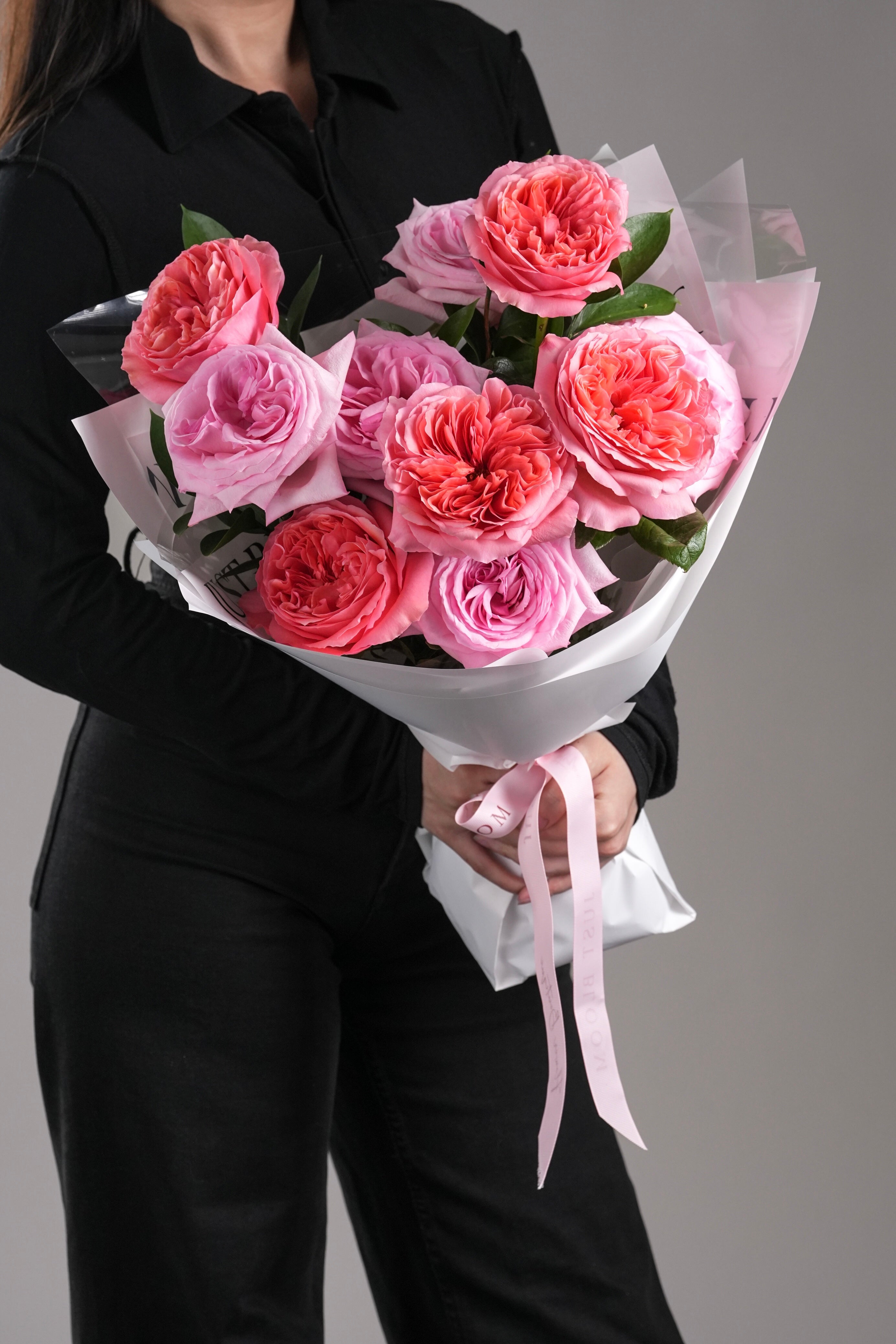 Side view of Angel bouquet showcasing layered petals and feminine pink palette