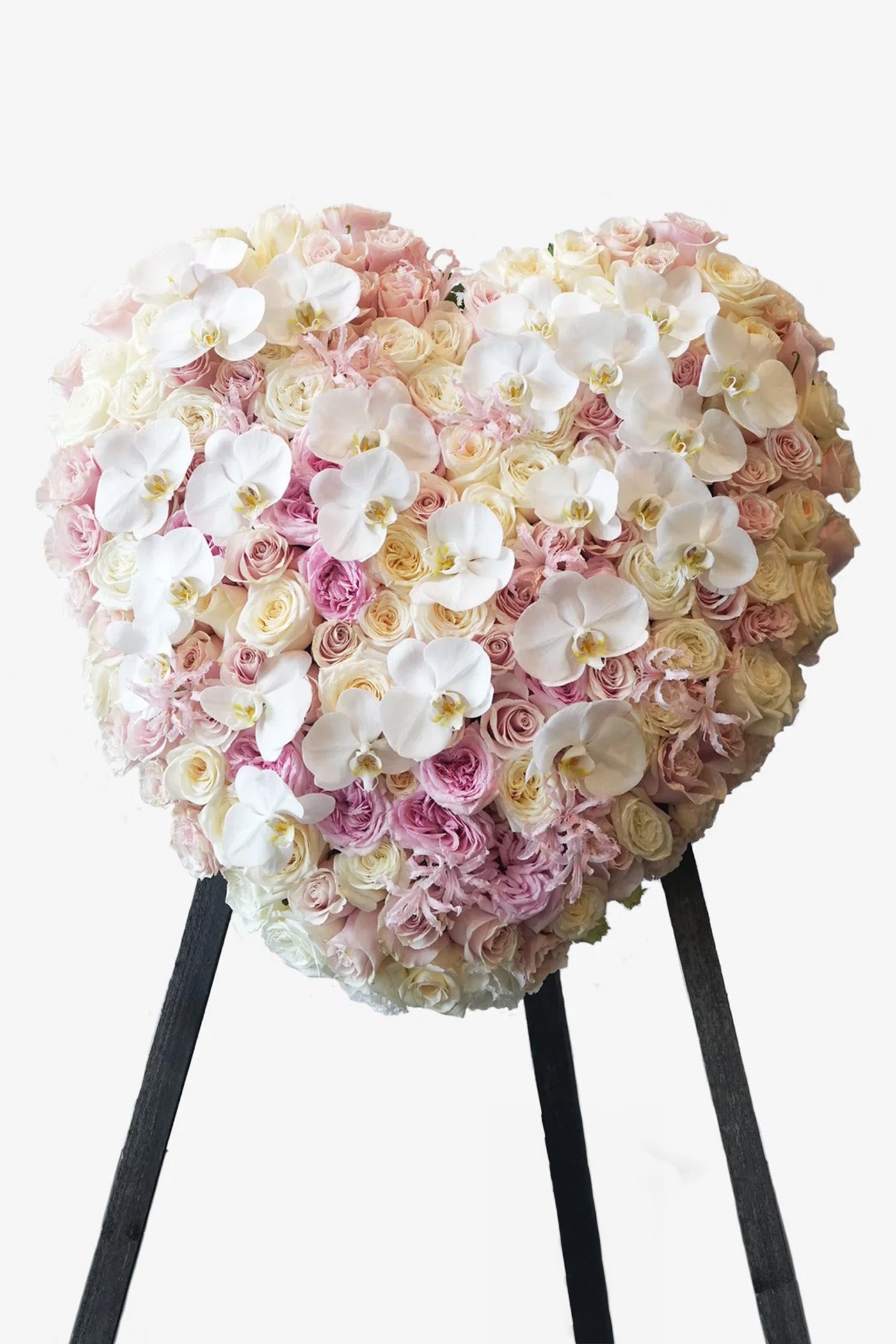 "Whispering Blooms" is a premium sympathy flower stand with Ecuadorian and Dutch flowers that is thoughtfully designed for expressing condolences during times of sorrow.