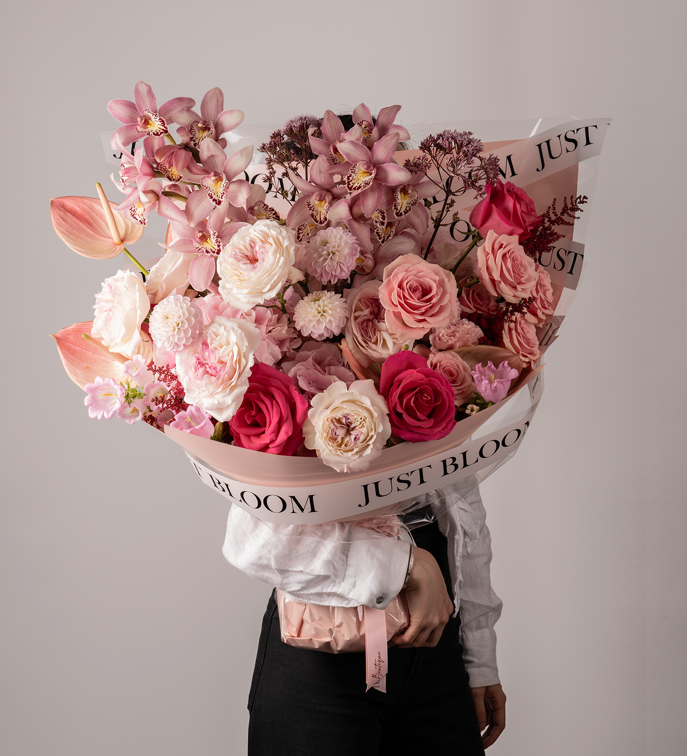 Astrid Luxurious Pink Floral Bouquet Held by Woman – Full view by Just Bloom Hong Kong