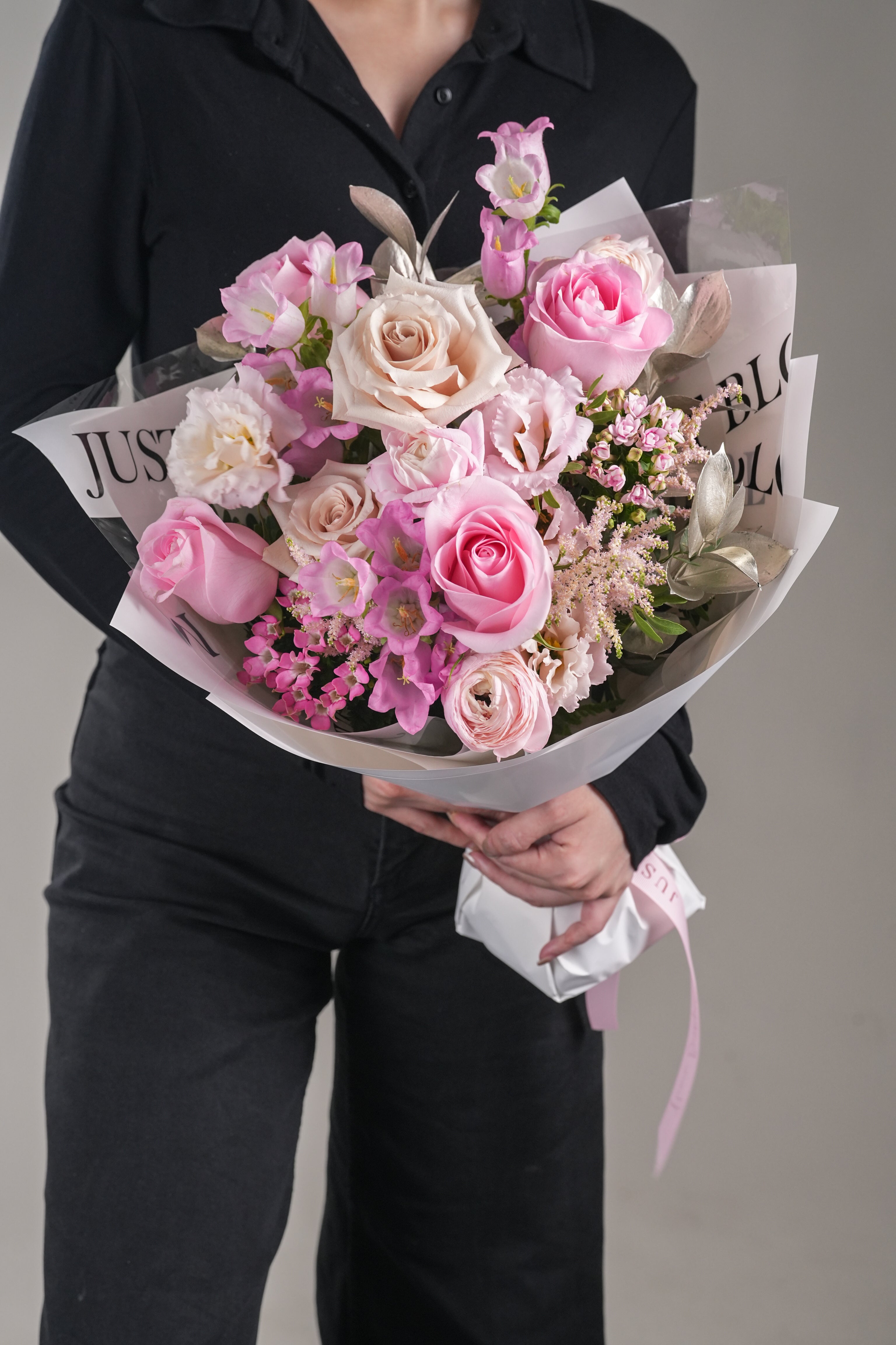 Close-up of Cadence bouquet – delicate pink blooms and flower fillers