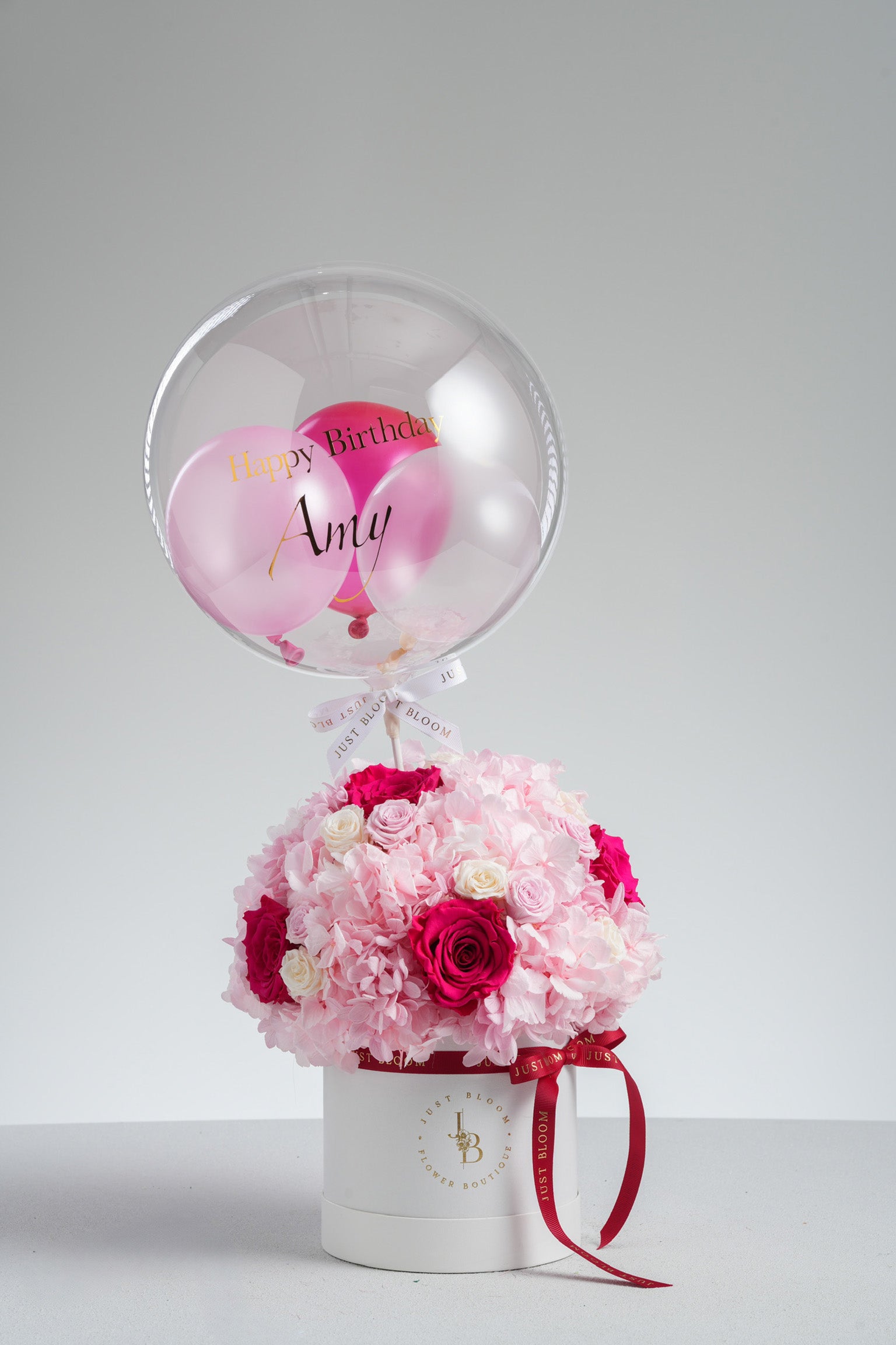 Calliope preserved flower box with red and pink roses in white round gift box