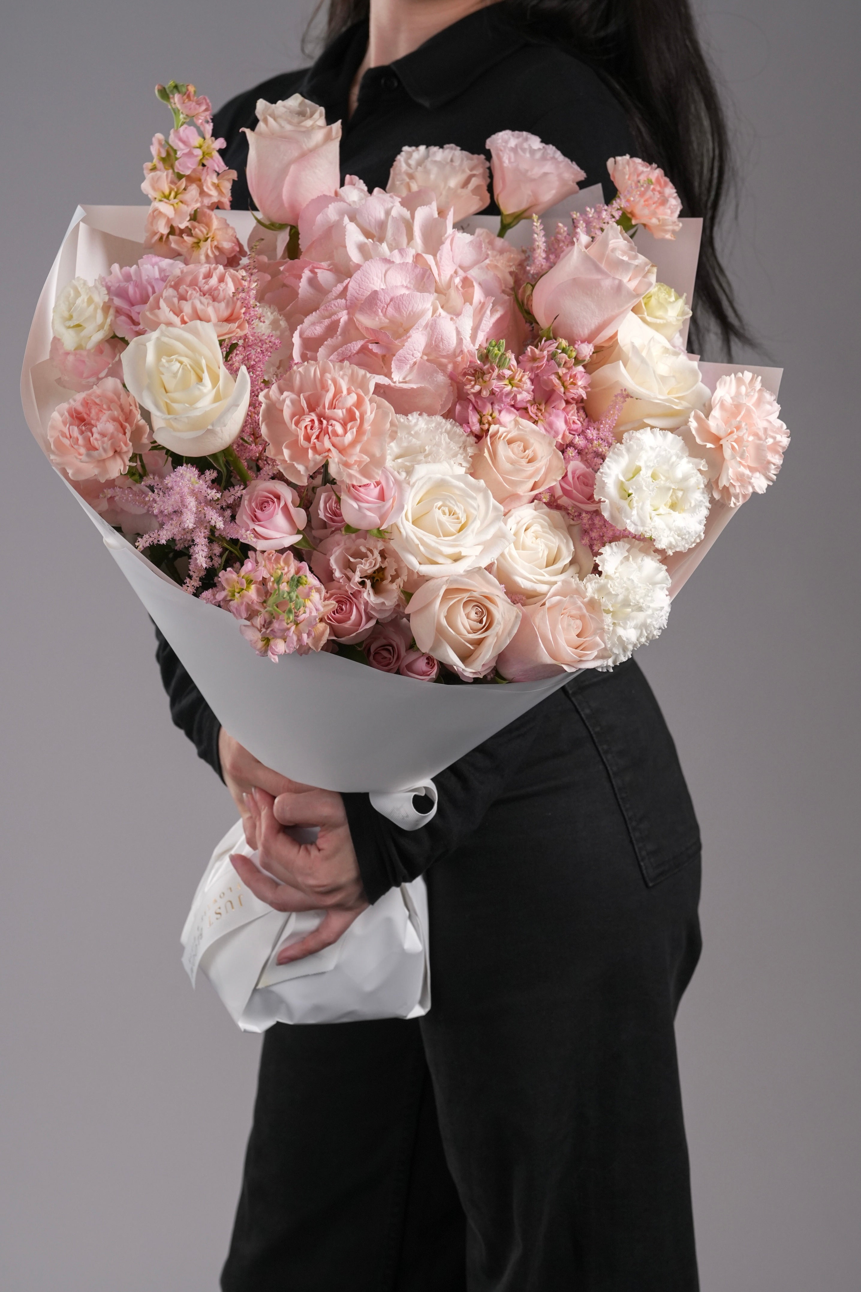 Side view of Alice bouquet showing pastel roses, hydrangea and delicate textures
