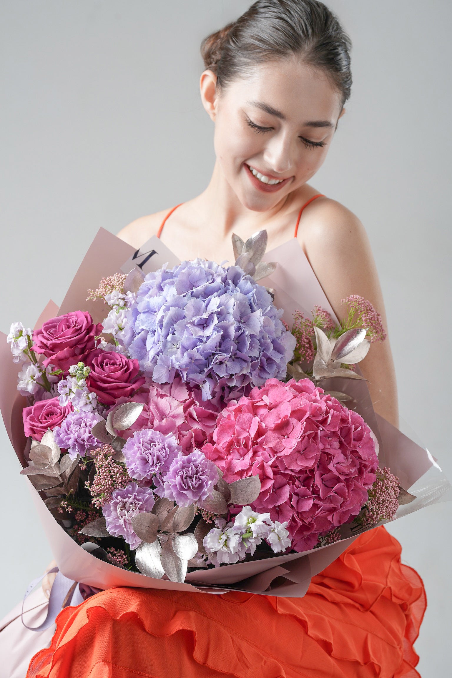 Elegant bouquet with lisianthus, roses, and hydrangeas, designed for heartfelt appreciation and timeless beauty.
