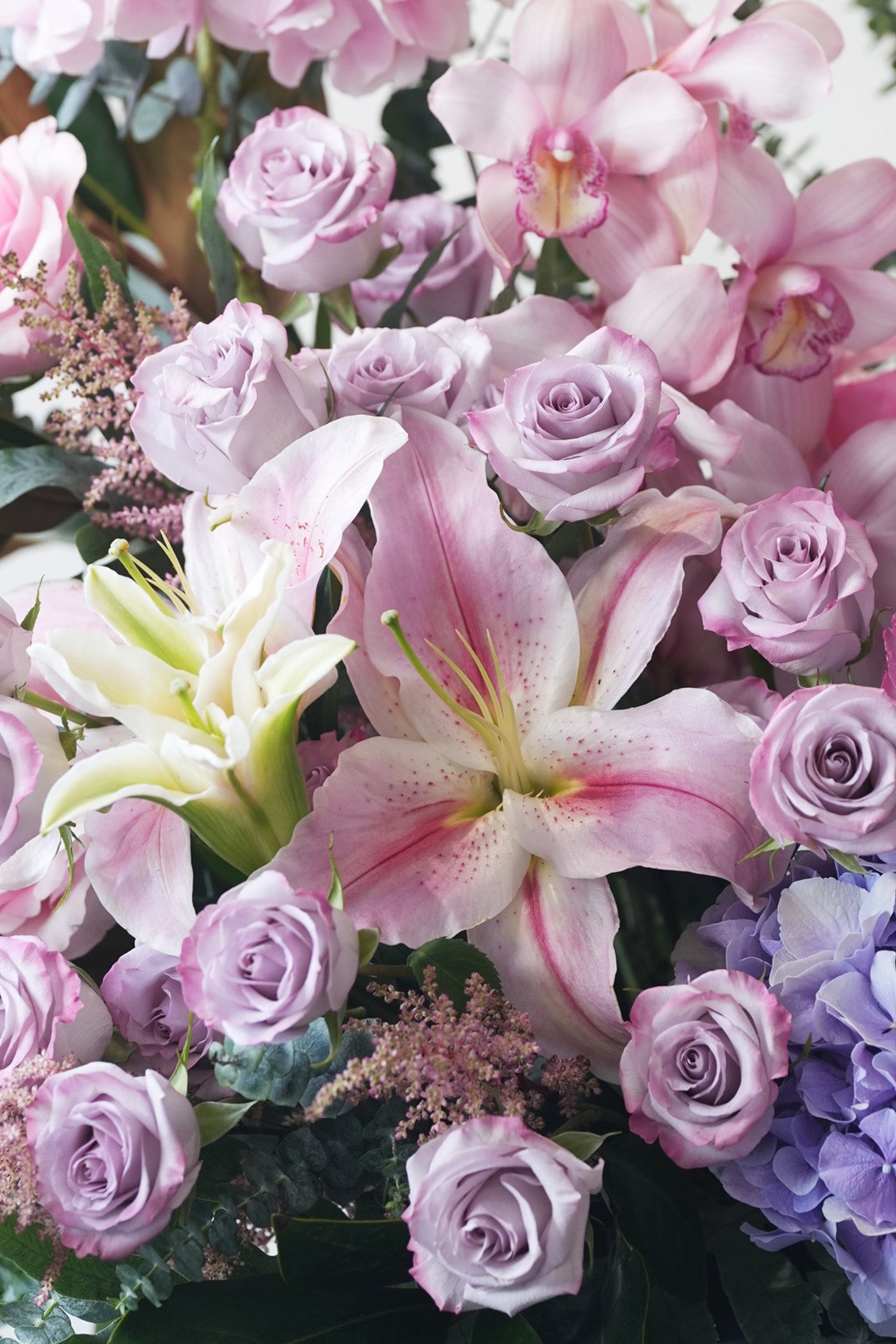 Detail close-up of pink roses, lavender hydrangeas and cymbidium orchids – Elora floral stand by Just Bloom Hong Kong