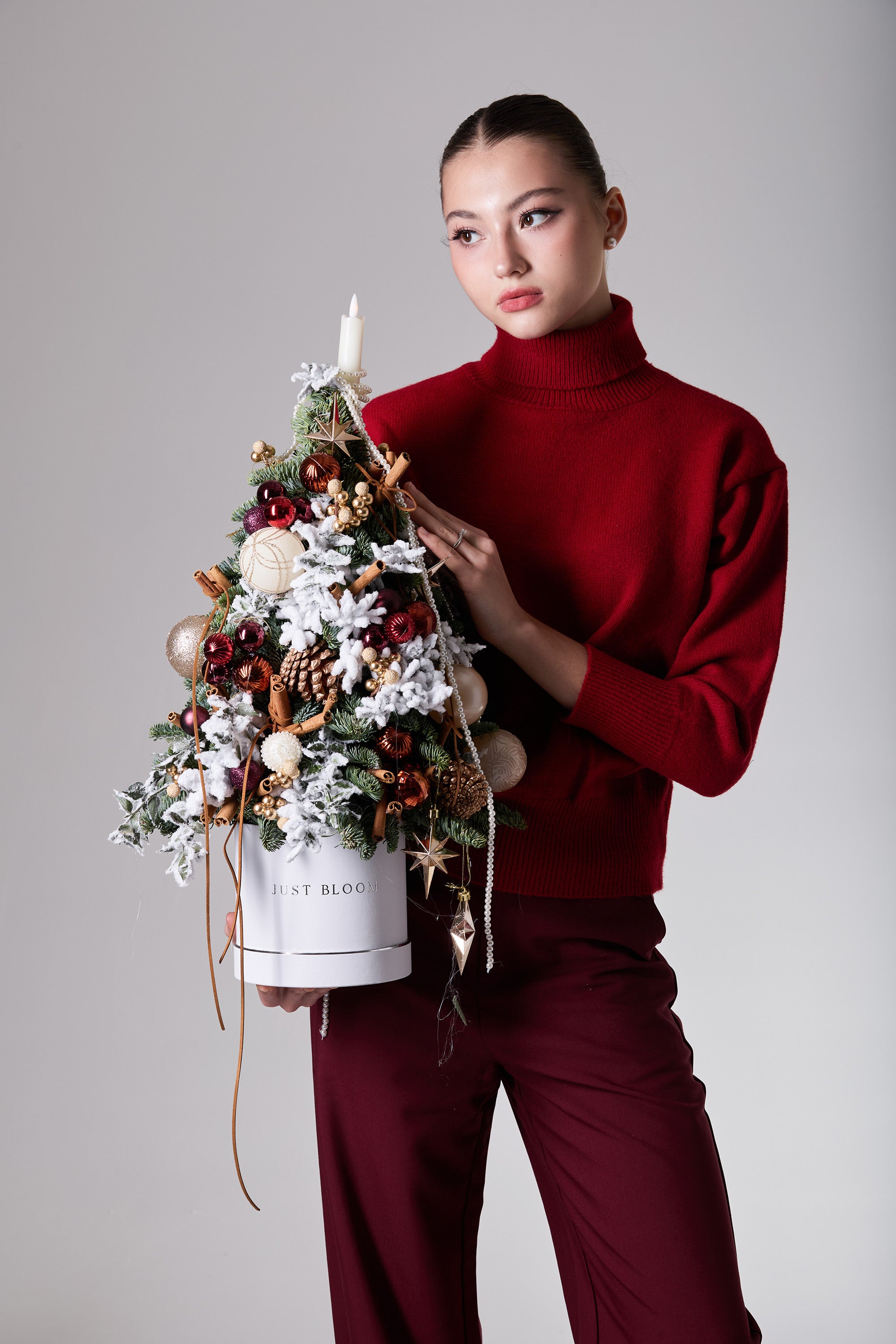 Frosted Emberlight fresh floral Christmas tree with frosted evergreens and festive accents