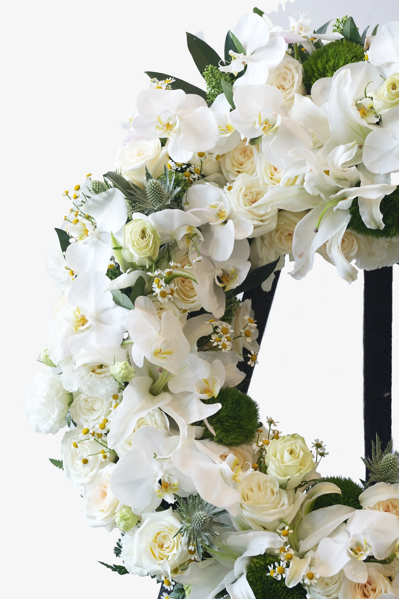 Side detail of Gentle Blessings white funeral wreath with dianthus and sea hollies by Just Bloom Hong Kong