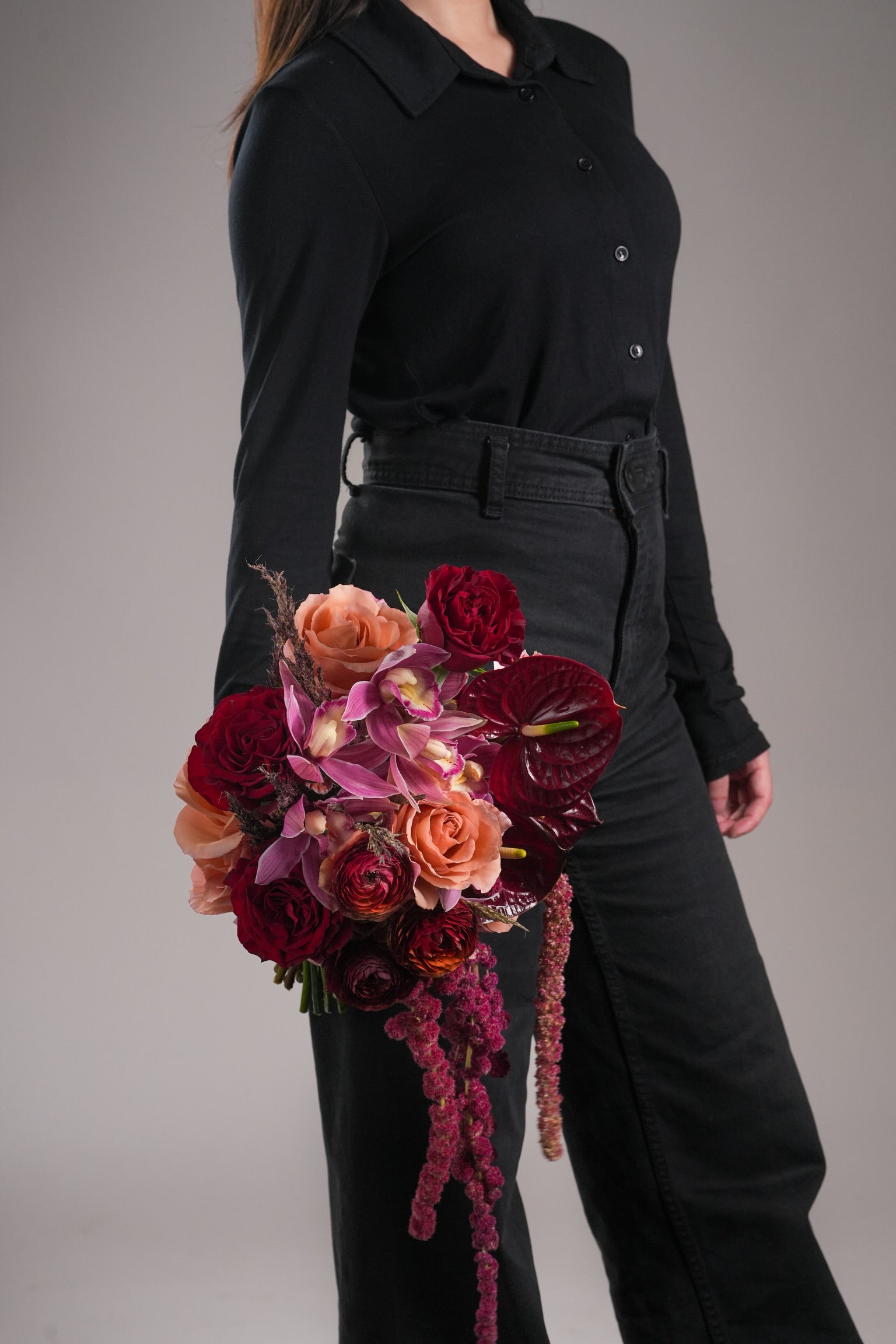 Just Bloom HK Gloria elegant cascading bouquet with garden roses and orchids, held in hand