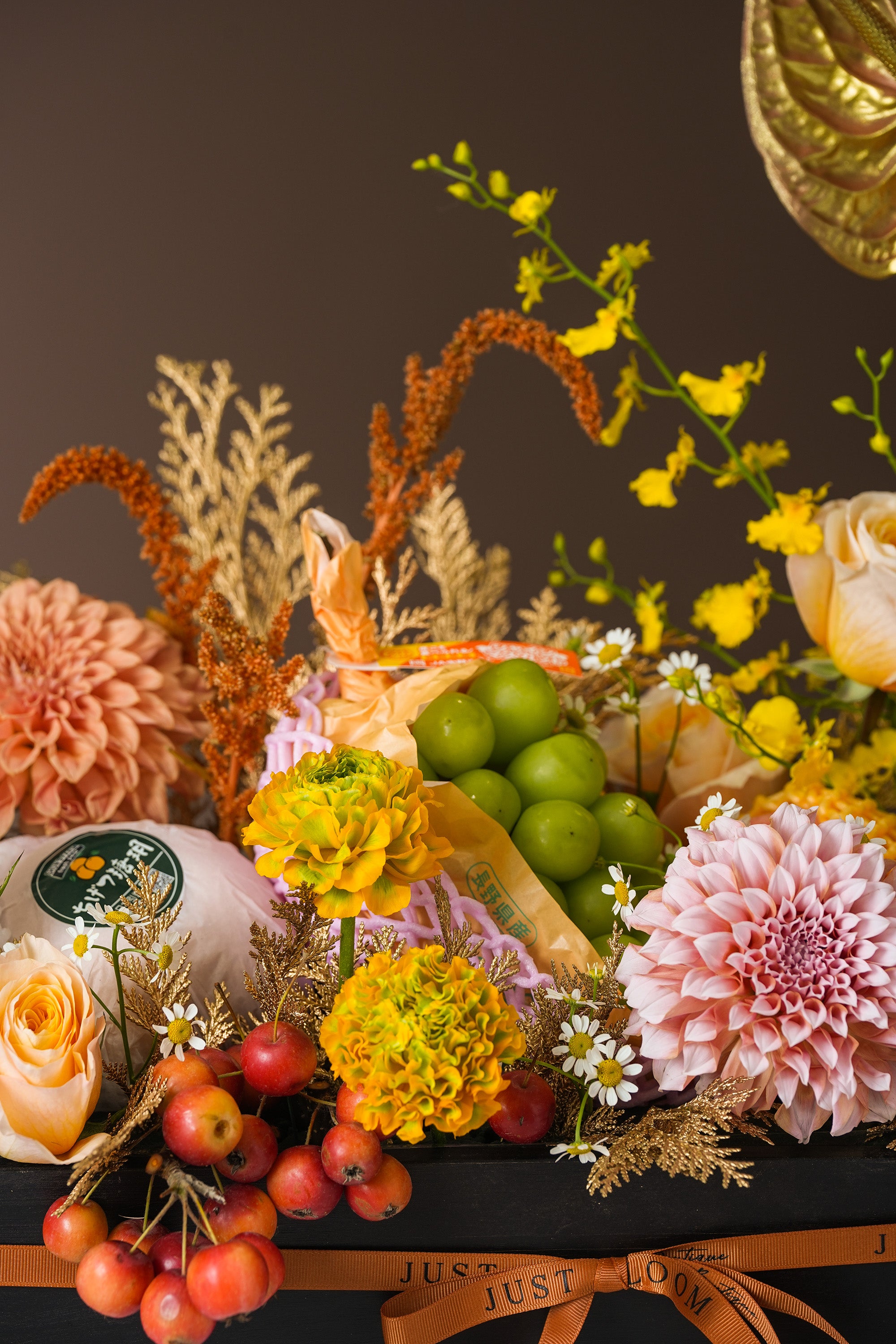 Golden Harvest Mid-Autumn edition detail with golden flowers, fresh fruits, and festive accents