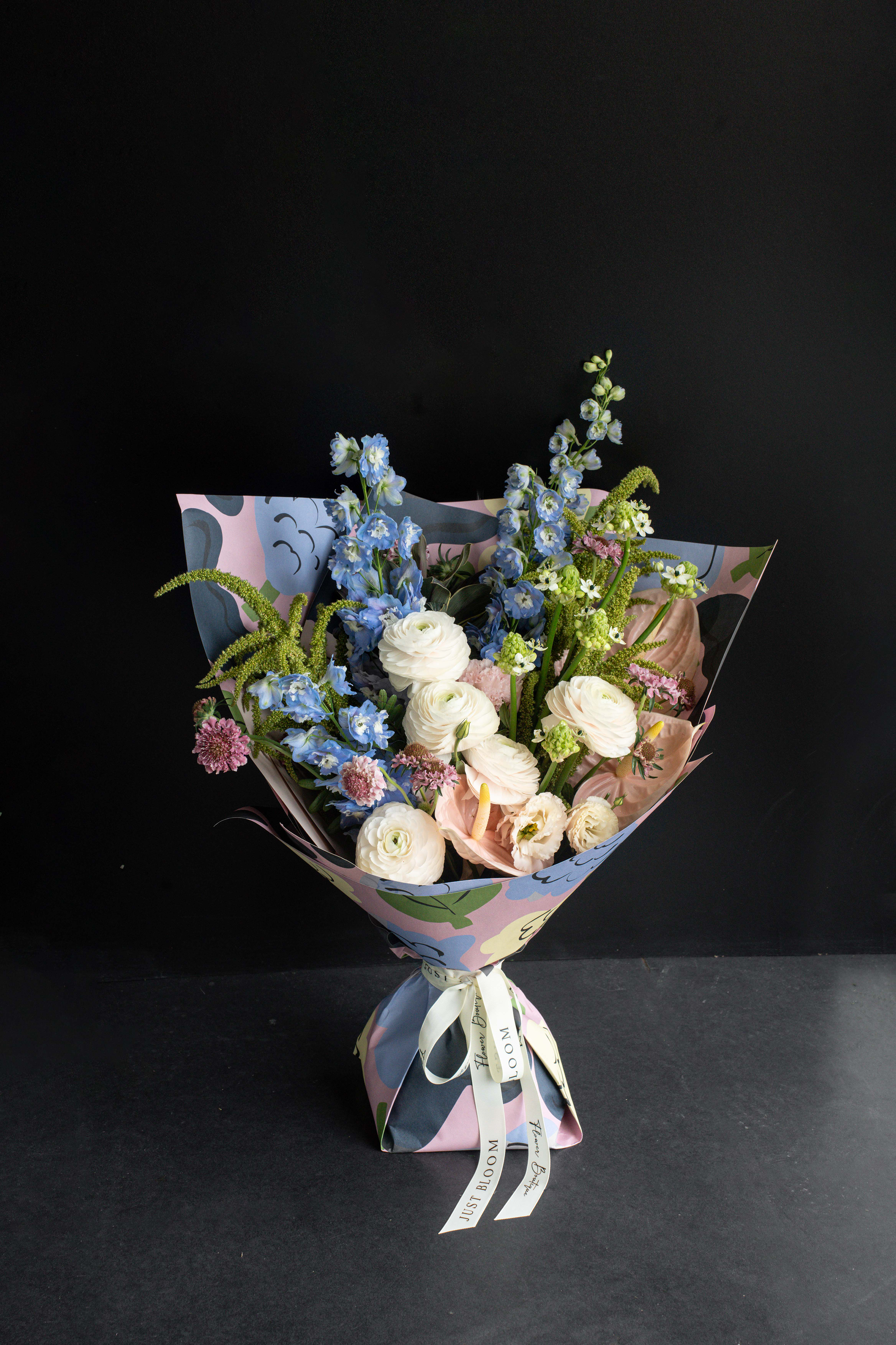 Helsinki Bloom Bouquet with Ranunculuses, Delphiniums, Anthuriums, and Scabiosas by Just Bloom Hong Kong