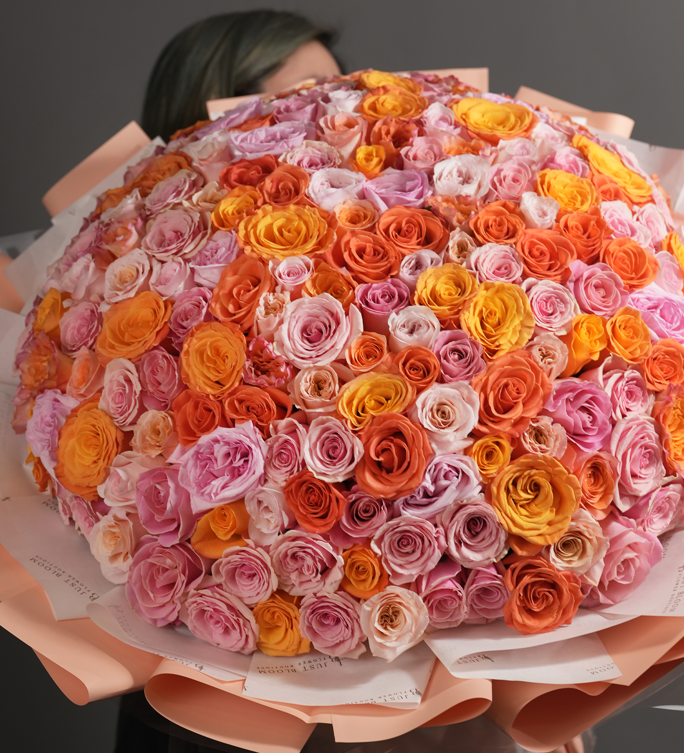Close-up of Alondra bouquet showing premium roses in full bloom and vivid colours