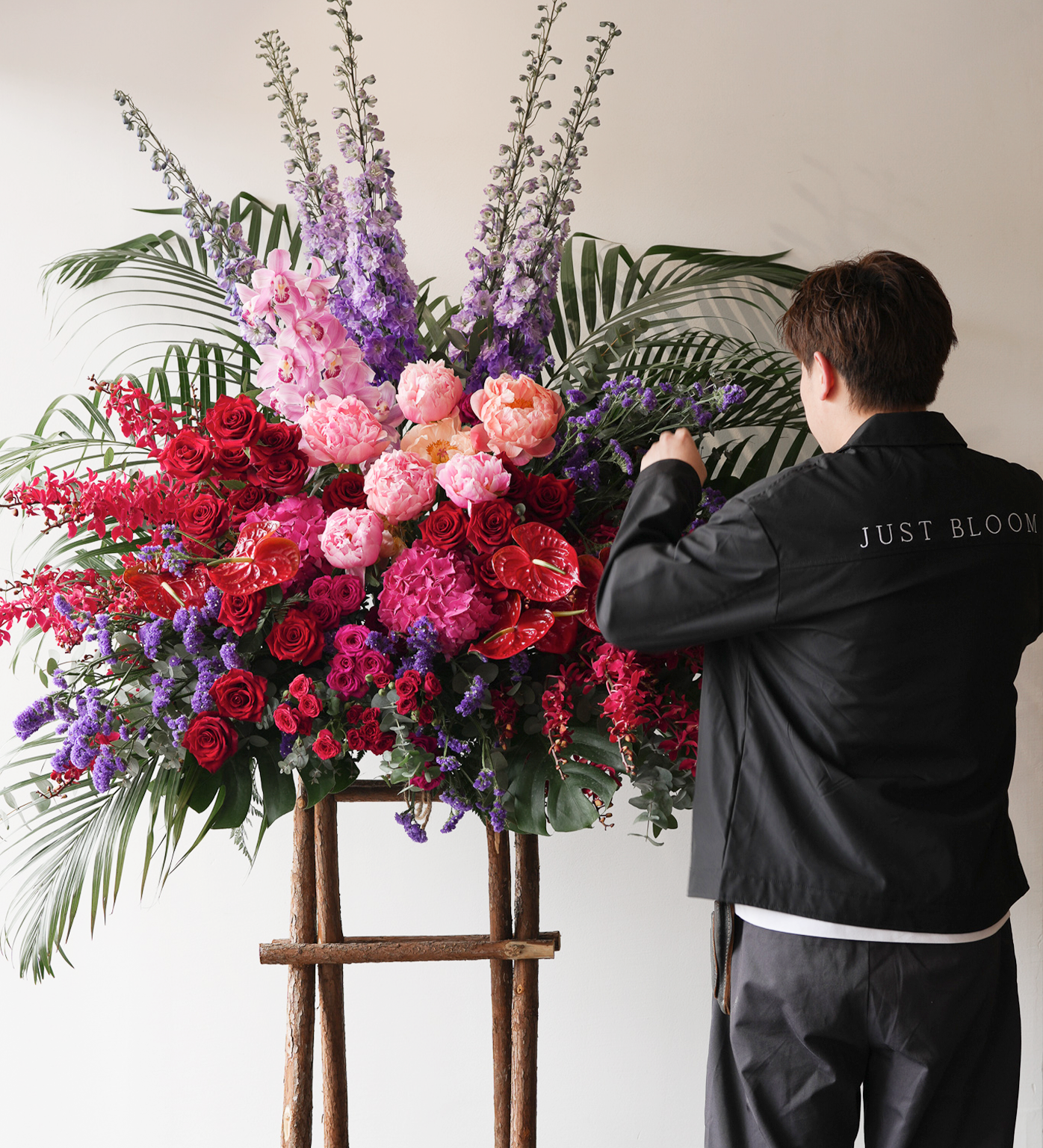 Hayden flower stand arrangement detail pink peonies red roses viburnums close up Just Bloom HK
