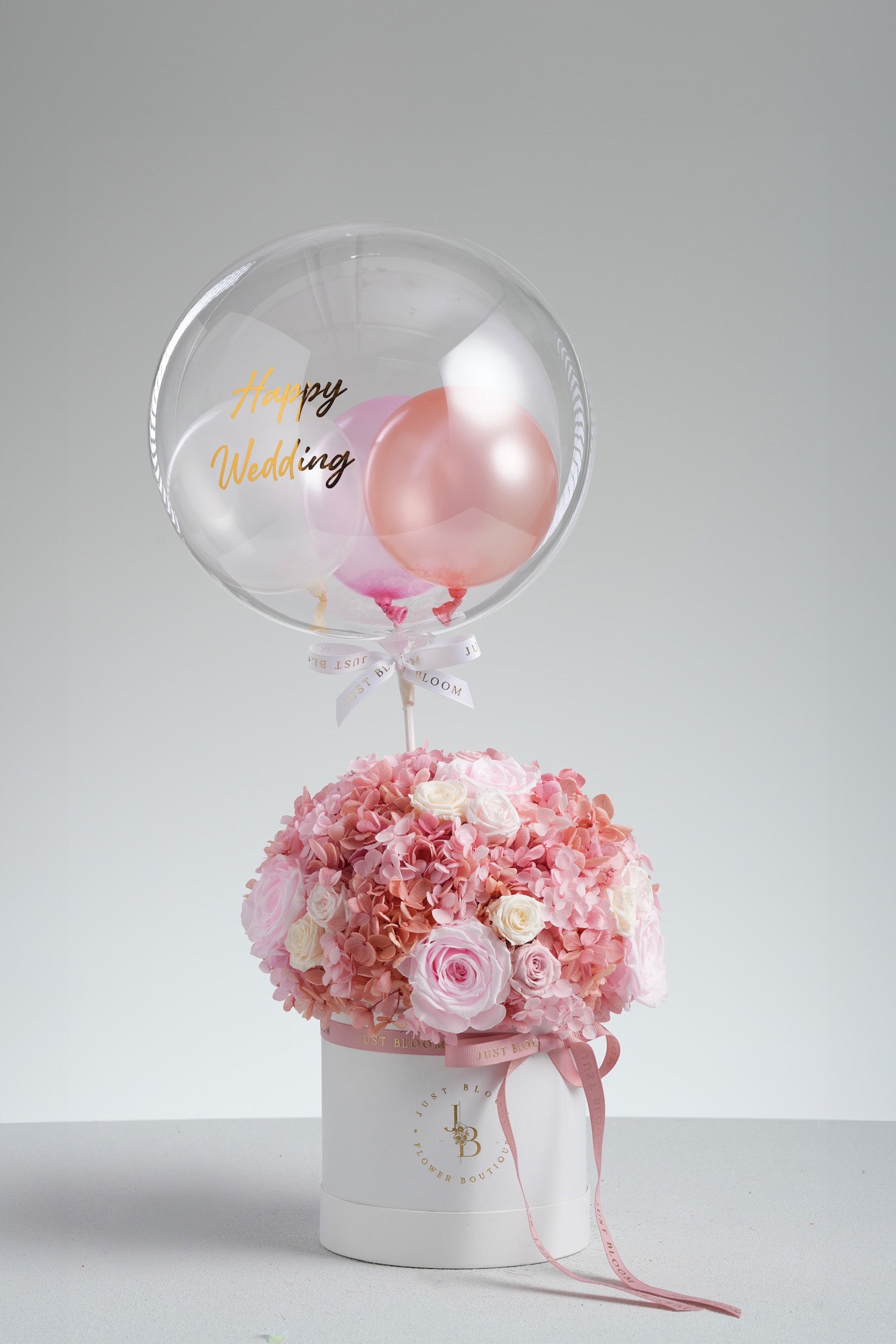 Kyra pink preserved rose and hydrangea flower box with balloon decoration and Happy Wedding text
