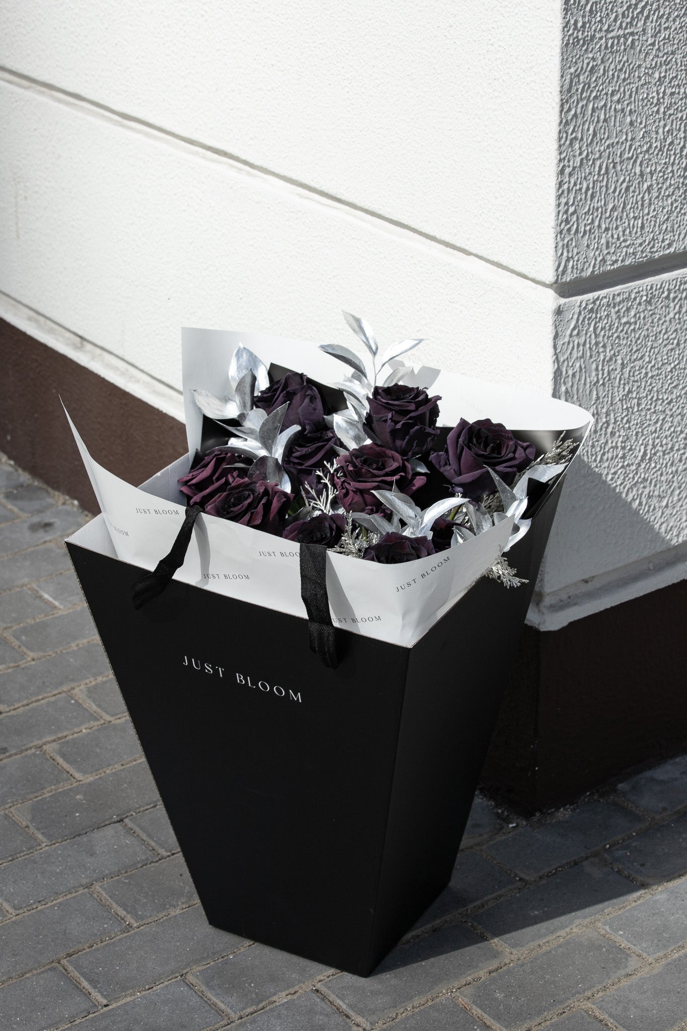 Midnight Passion fresh flower bouquet with deep burgundy black roses and silver foliage for Valentine's Day