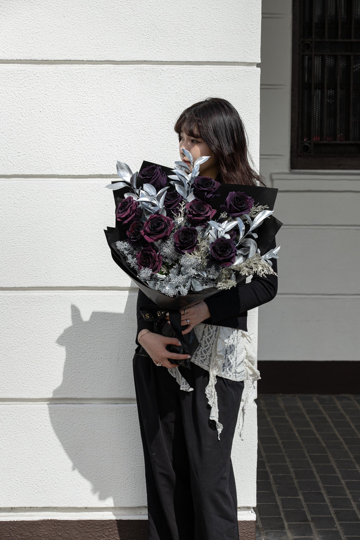 Midnight Passion fresh flower bouquet with deep burgundy black roses and silver foliage for Valentine's Day