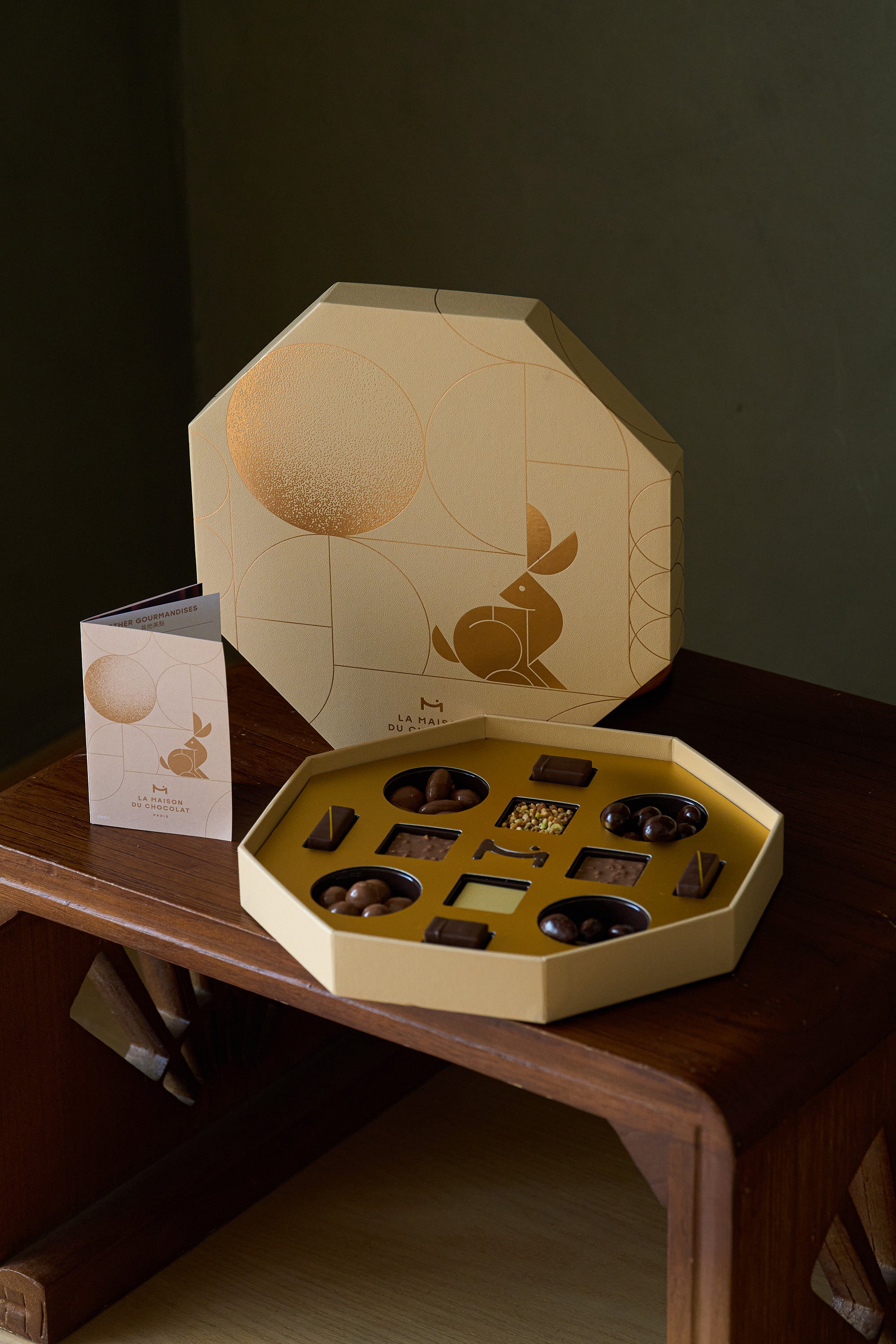 Open La Maison du Chocolat Radiance of Lunar Hare chocolate gift box showing assorted chocolates and moon rabbit motif — Just Bloom Hong Kong