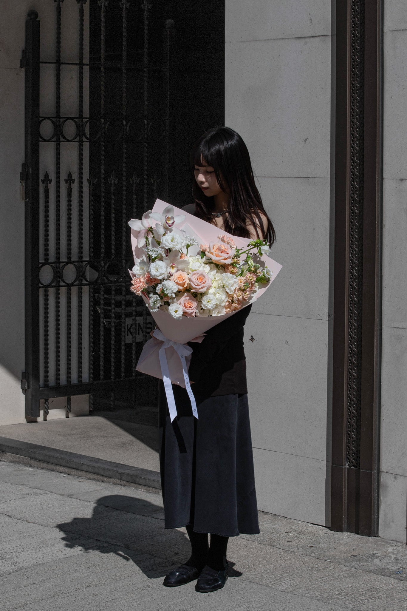 Peach and white blooms with orchid accents. A warm, sophisticated statement. Order by February 9 for Valentine's Day delivery. Hong Kong luxury florist.