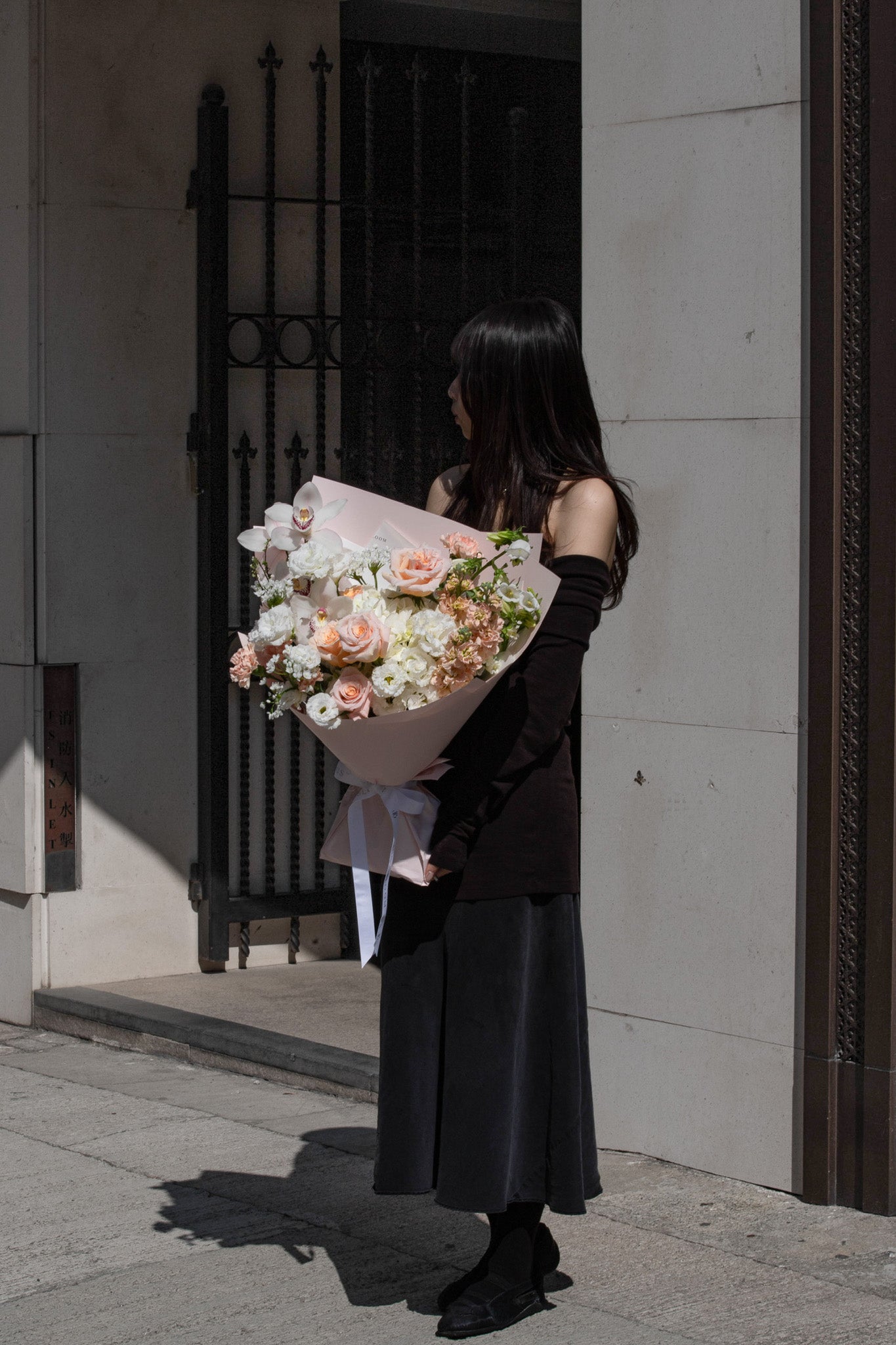 Peach and white blooms with orchid accents. A warm, sophisticated statement. Order by February 9 for Valentine's Day delivery. Hong Kong luxury florist.