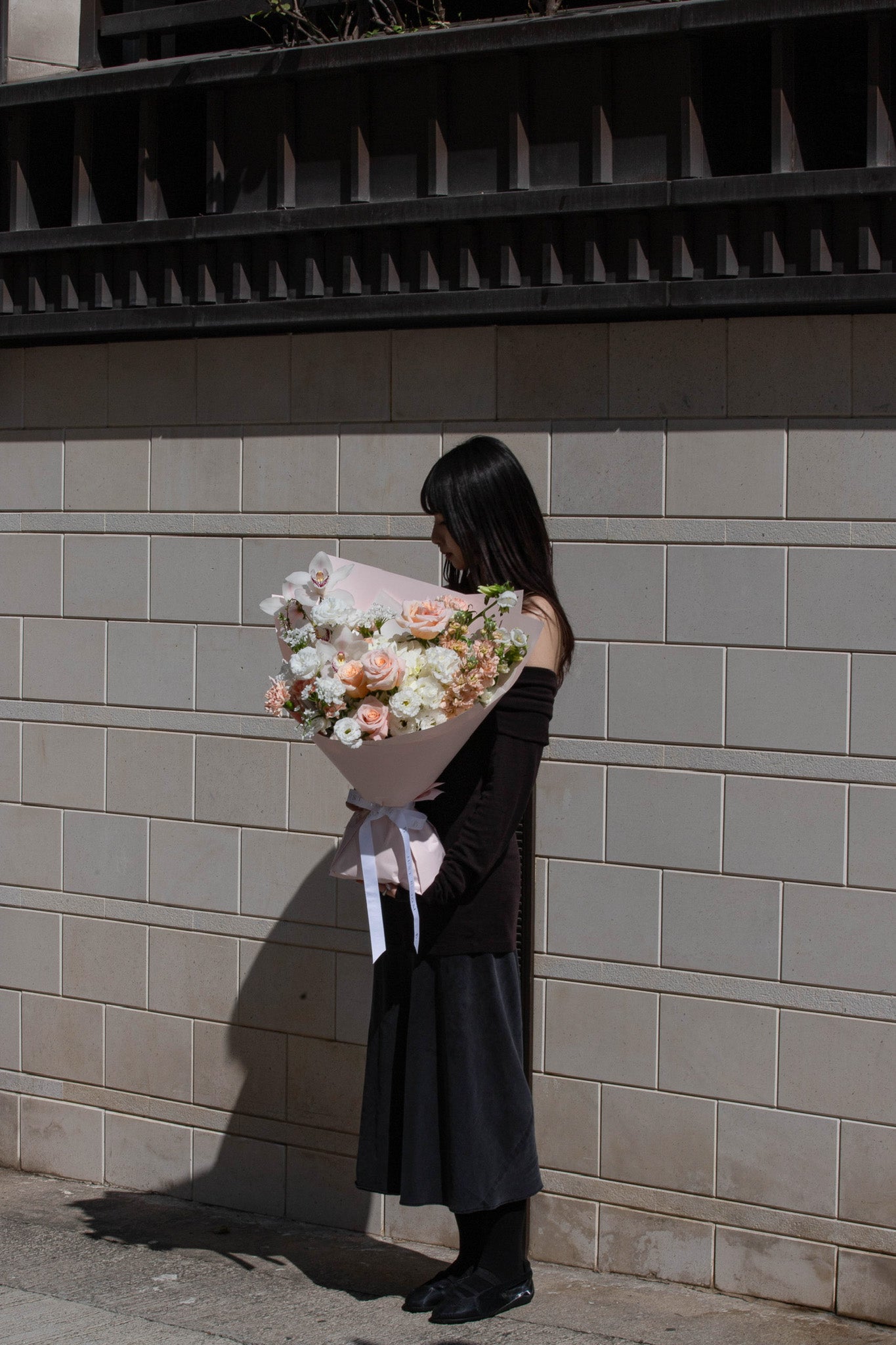 Peach and white blooms with orchid accents. A warm, sophisticated statement. Order by February 9 for Valentine's Day delivery. Hong Kong luxury florist.
