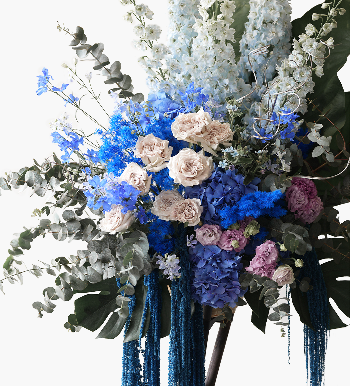 Raegan full grand opening flower stand with hydrangeas, eucalyptus, and trailing blue amaranthus