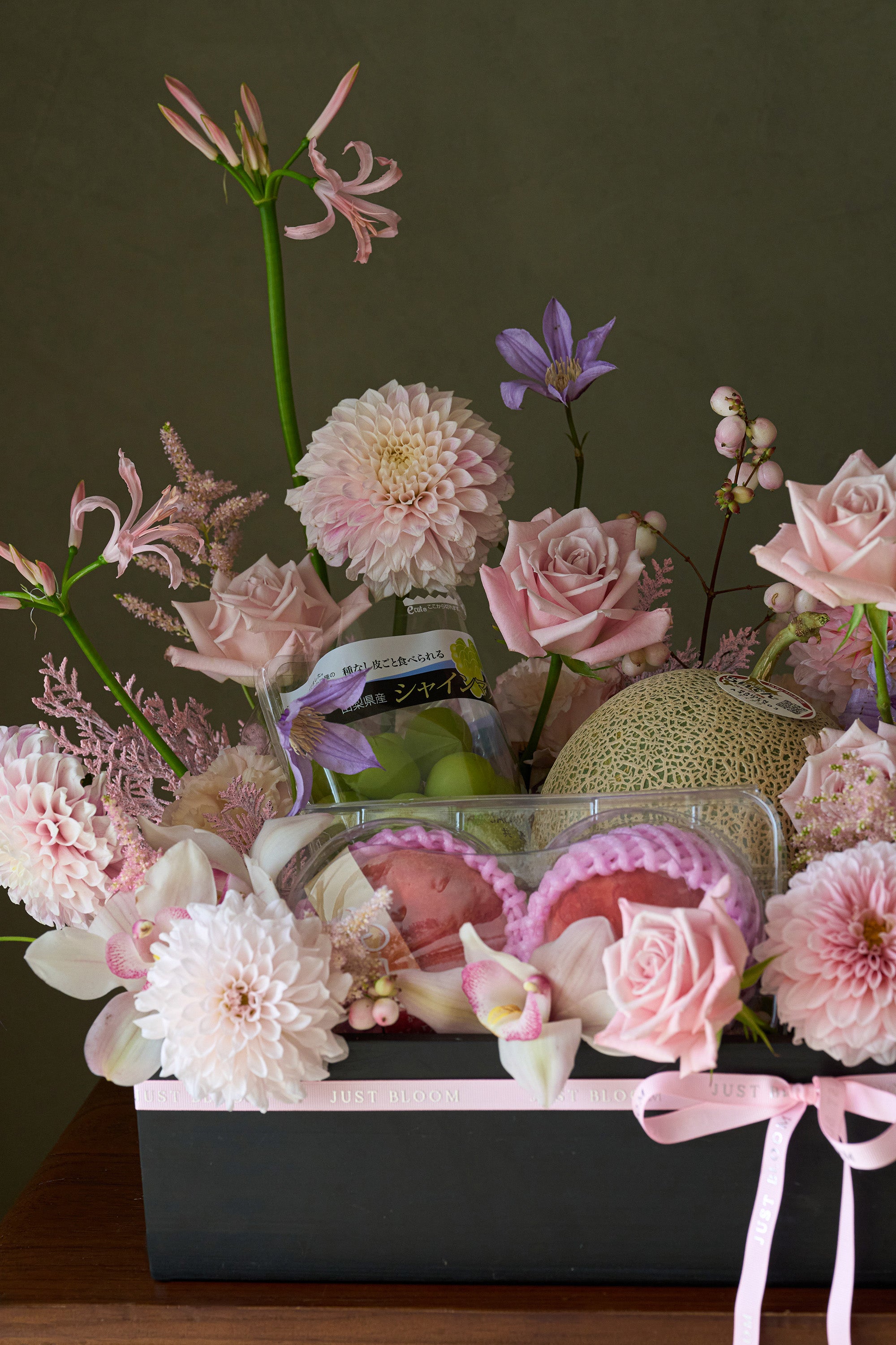 Close-up of Rosé Harvest flower box arrangement with grapes, melon and peaches — Just Bloom Hong Kong
