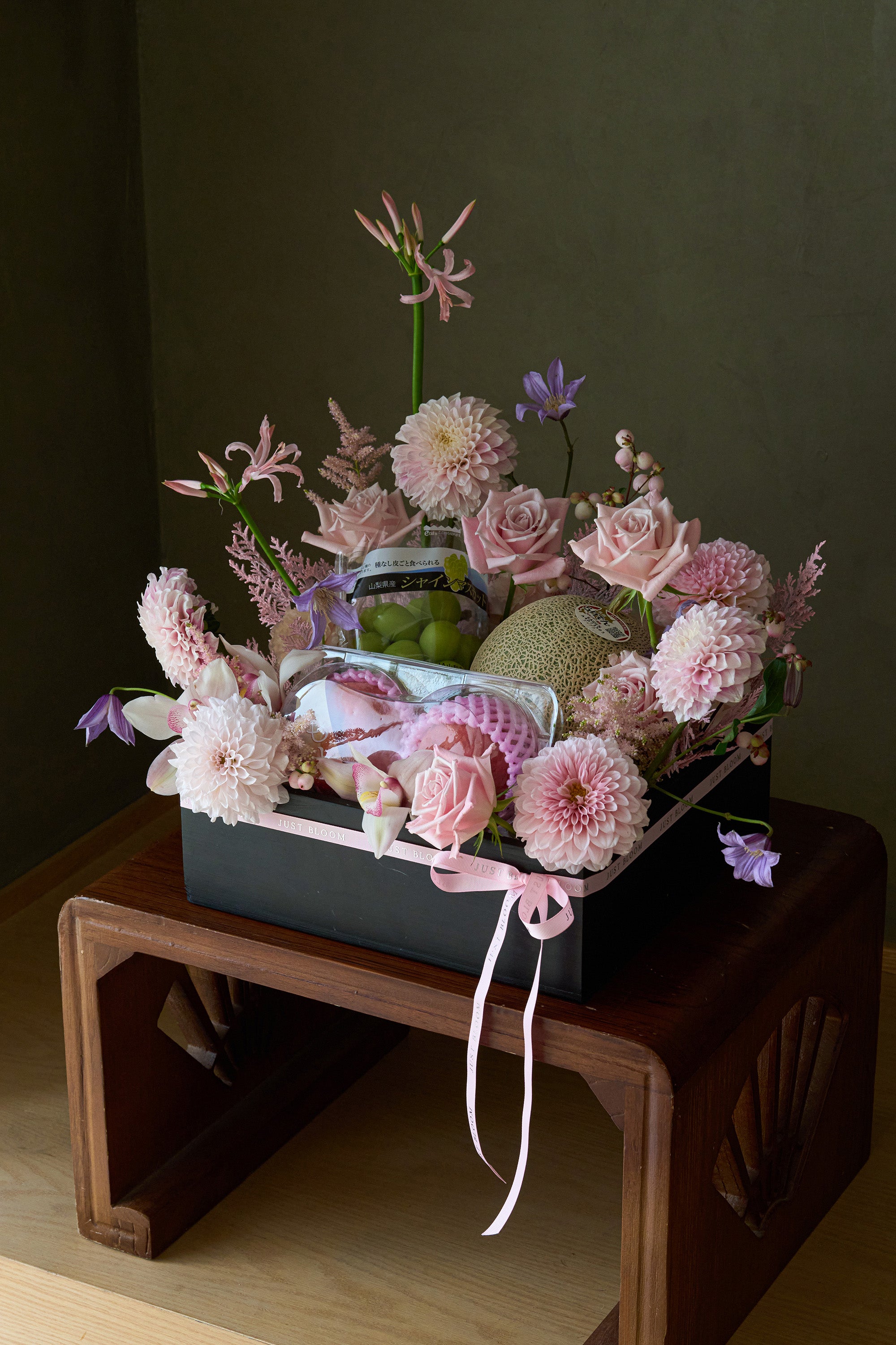 Just Bloom Rosé Harvest flower box with blush pink florals and Japanese seasonal fruit on a wooden stand — Just Bloom Hong Kong