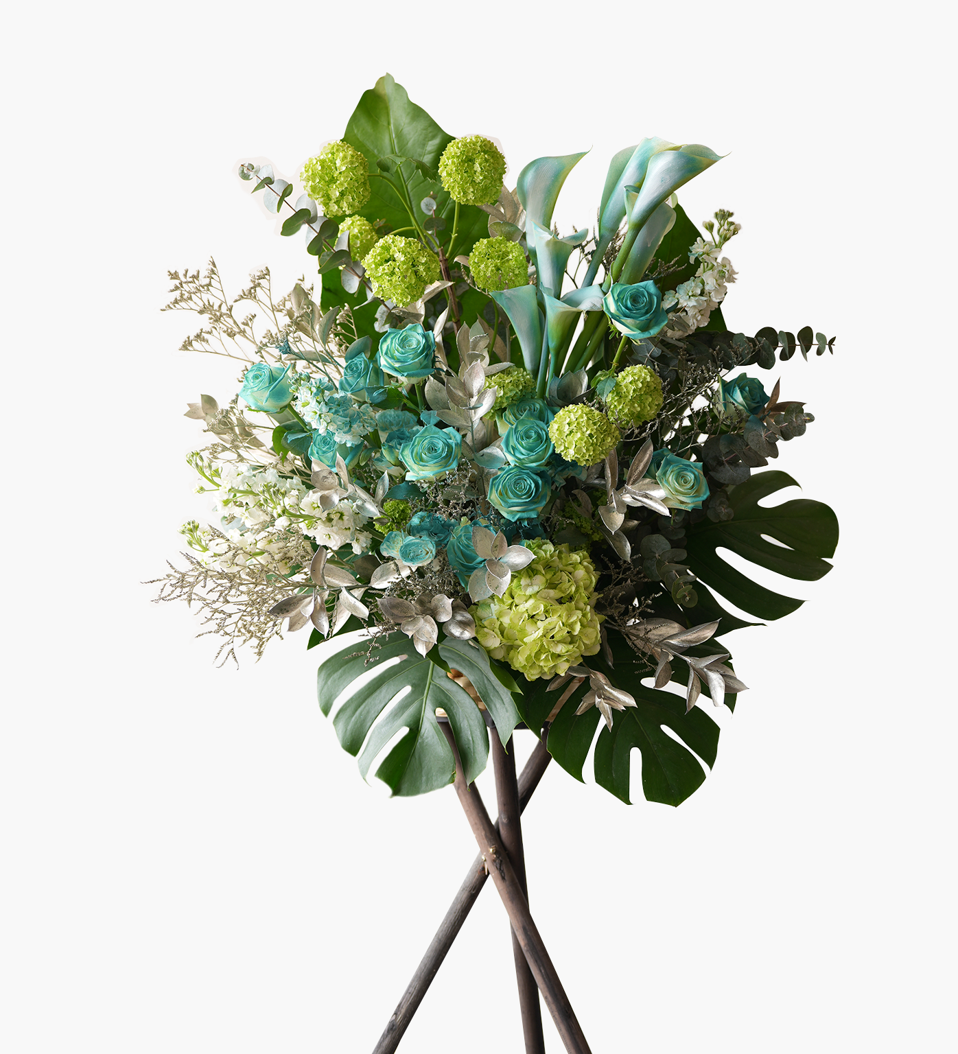 Rowan grand opening flower stand with aqua blue roses, lime viburnums, and silver leaves