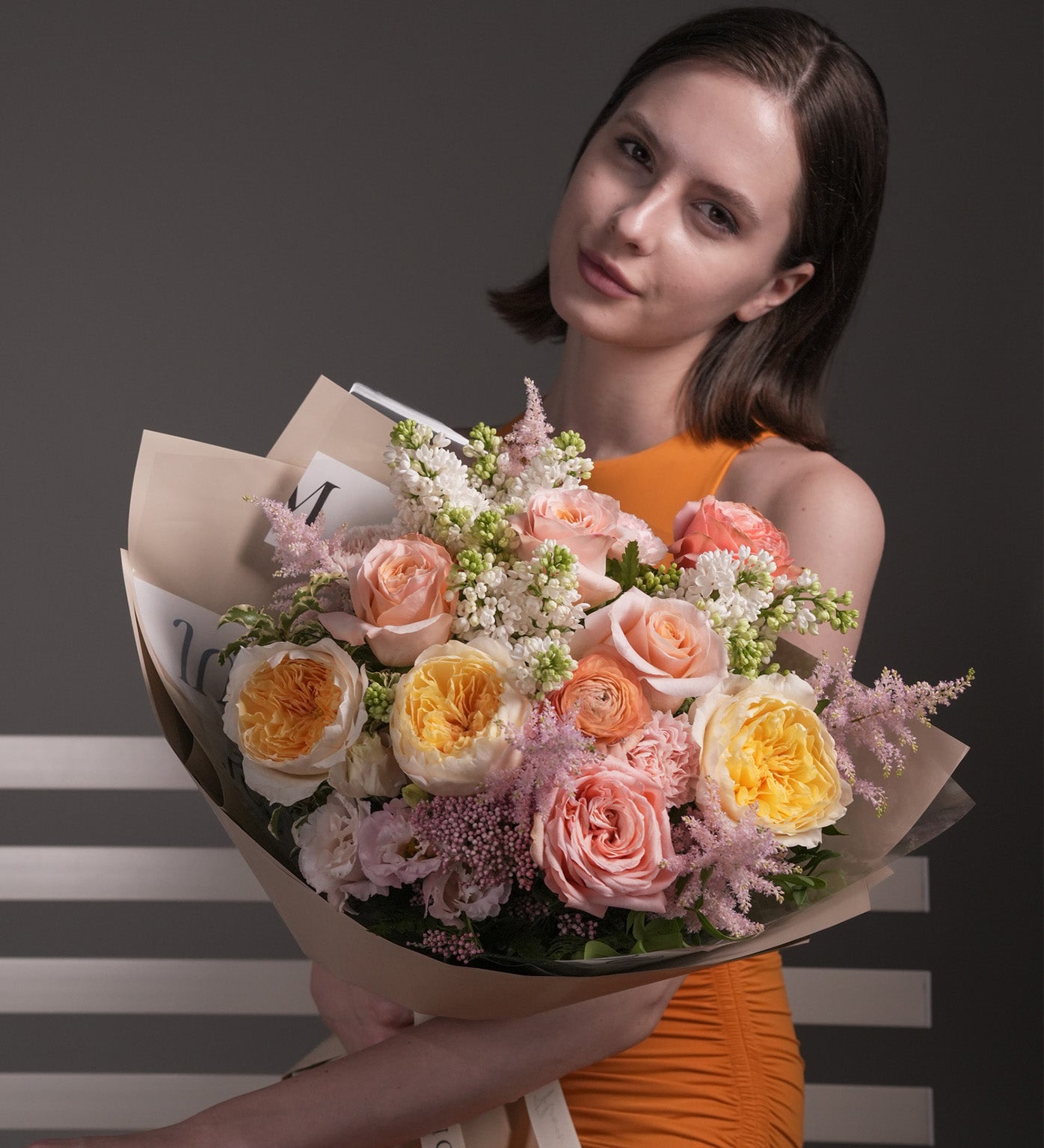Spring Serenade romantic bouquet featuring roses, Juliet garden roses, astilbes, and premium Dutch flowers