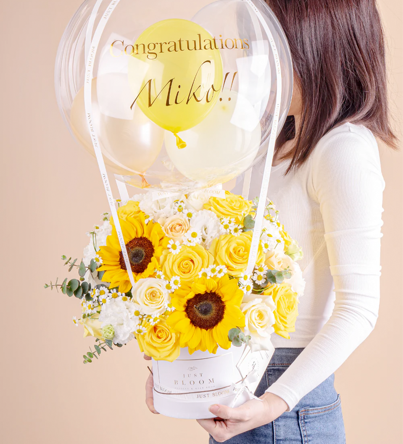 Stella flower box with sunflowers, roses, and chamomiles in bright yellow tones