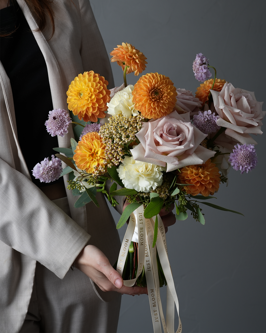 Isabel bridal bouquet orange dahlias purple roses white carnations wedding flowers Just Bloom HK