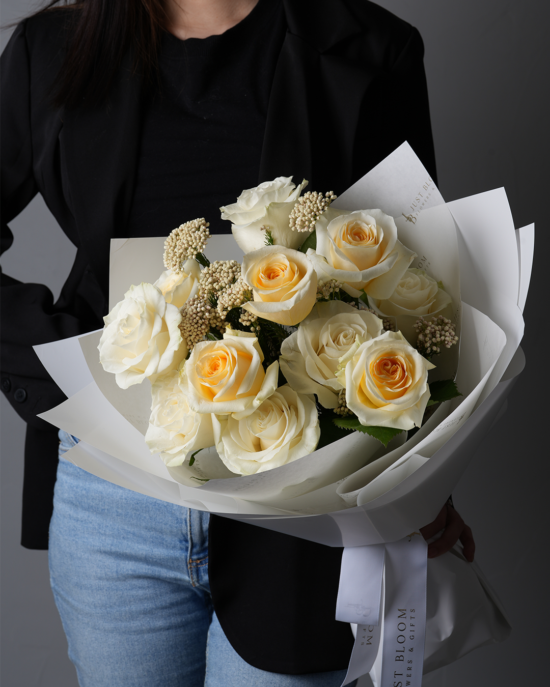 Paityn bouquet featuring fresh yellow roses and delicate white blooms