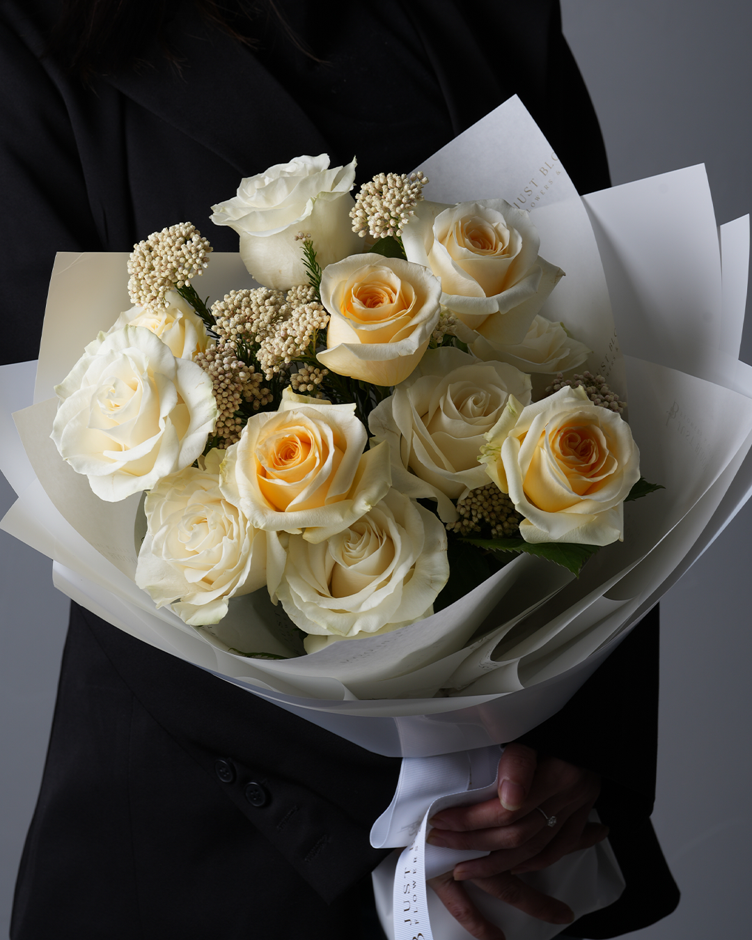 Paityn large bouquet of yellow-white roses and rice flowers with wrapping