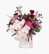 Colorful flower box by Just bloom × Hong Kong Florist, featuring stunning moth orchids, roses, hydrangeas, fillers, and eucalyptus in a beautiful blend of purple, pink, and red tones.