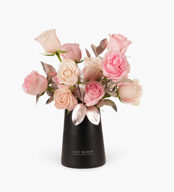 Bottle Flower Gift by Just bloom × Hong Kong Florist, featuring Ecuadorian pink and light pink roses with Dutch greenery, artfully arranged in a sleek black vase, radiating a romantic ambiance.