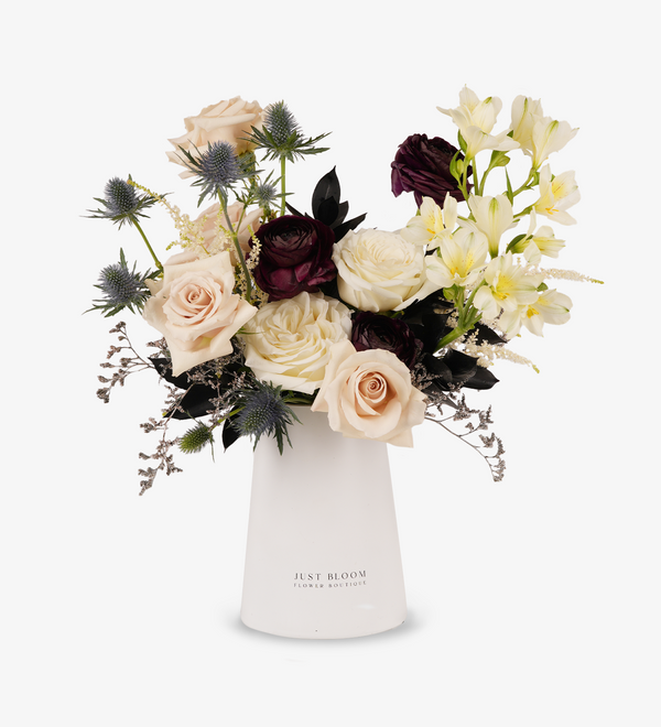 fresh vase arrangements by Just bloom × Hong Kong Florist, featuring a captivating blend of Ecuadorian roses and exquisite Dutch filler flowers, showcased in a sleek white vase, with deep red and white tones highlighting nobility and grace.