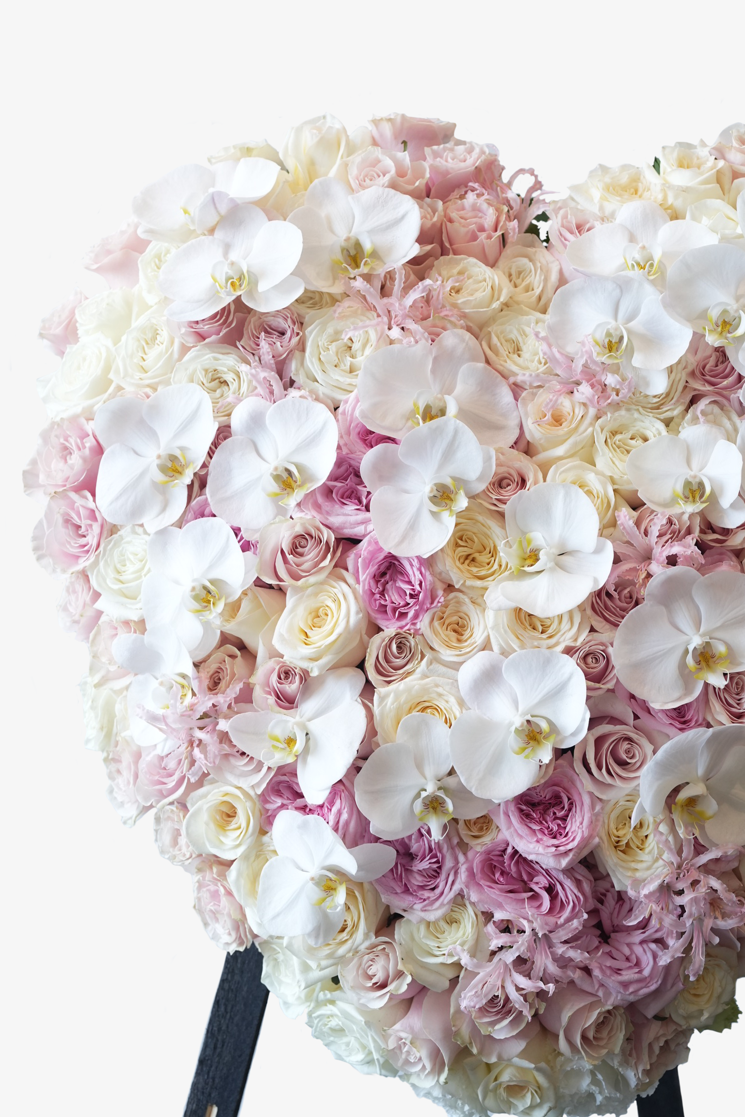 Close up of "Whispering Blooms" ,"Whispering Blooms" is a premium sympathy flower stand with Ecuadorian and Dutch flowers that is thoughtfully designed for expressing condolences during times of sorrow.