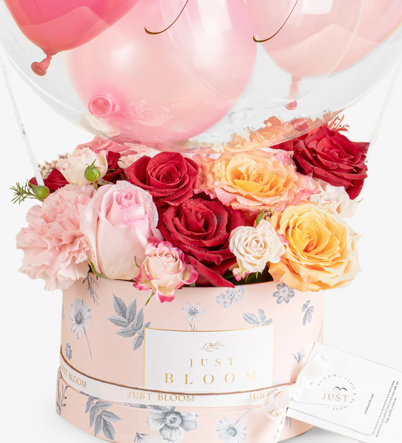 Close-up of Brinley flower box with red and peach roses and pink carnations – Just Bloom HK balloon arrangement