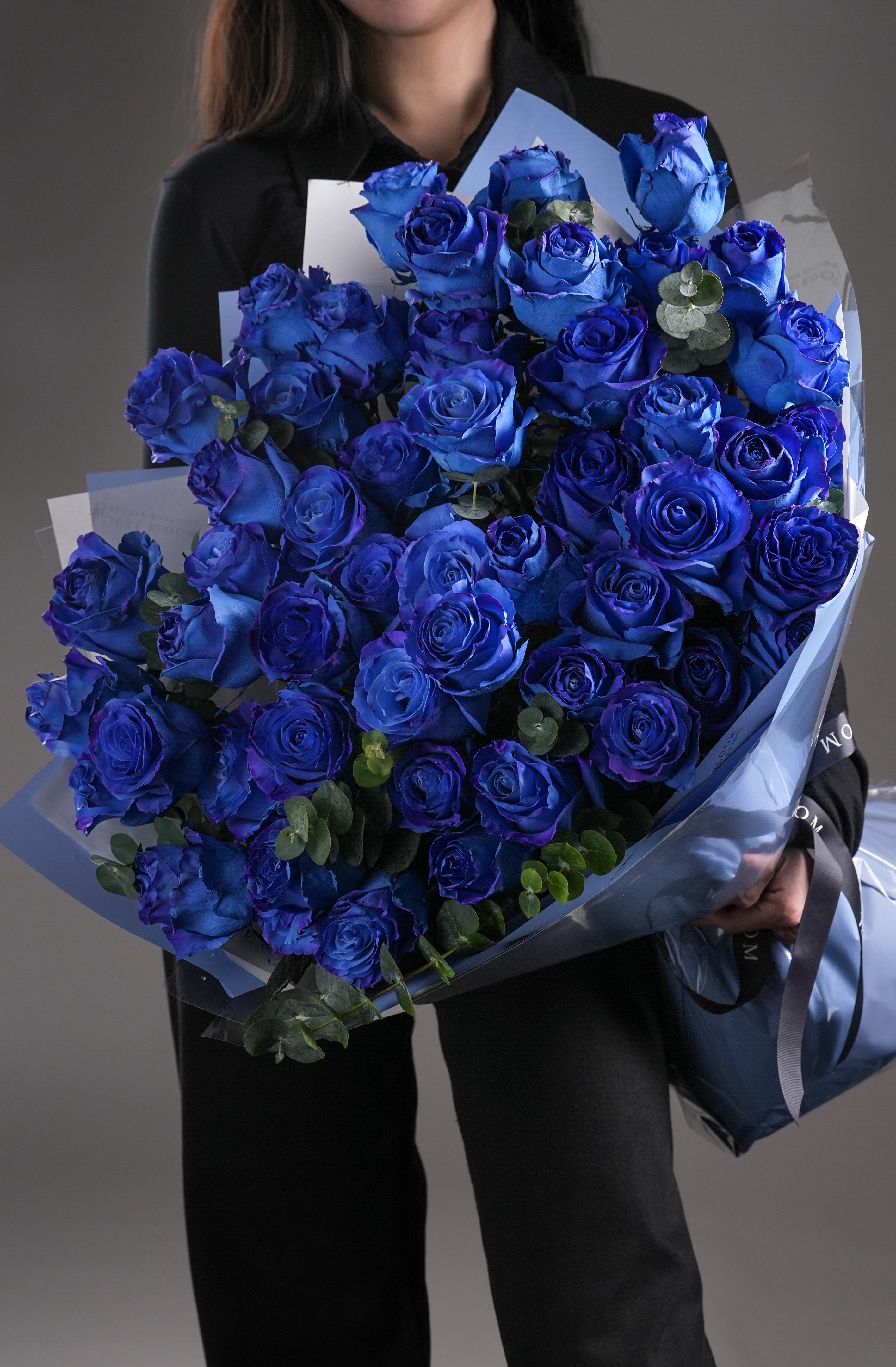 Elegant hand-tied bouquet of rare blue Ecuadorian roses from Just Bloom