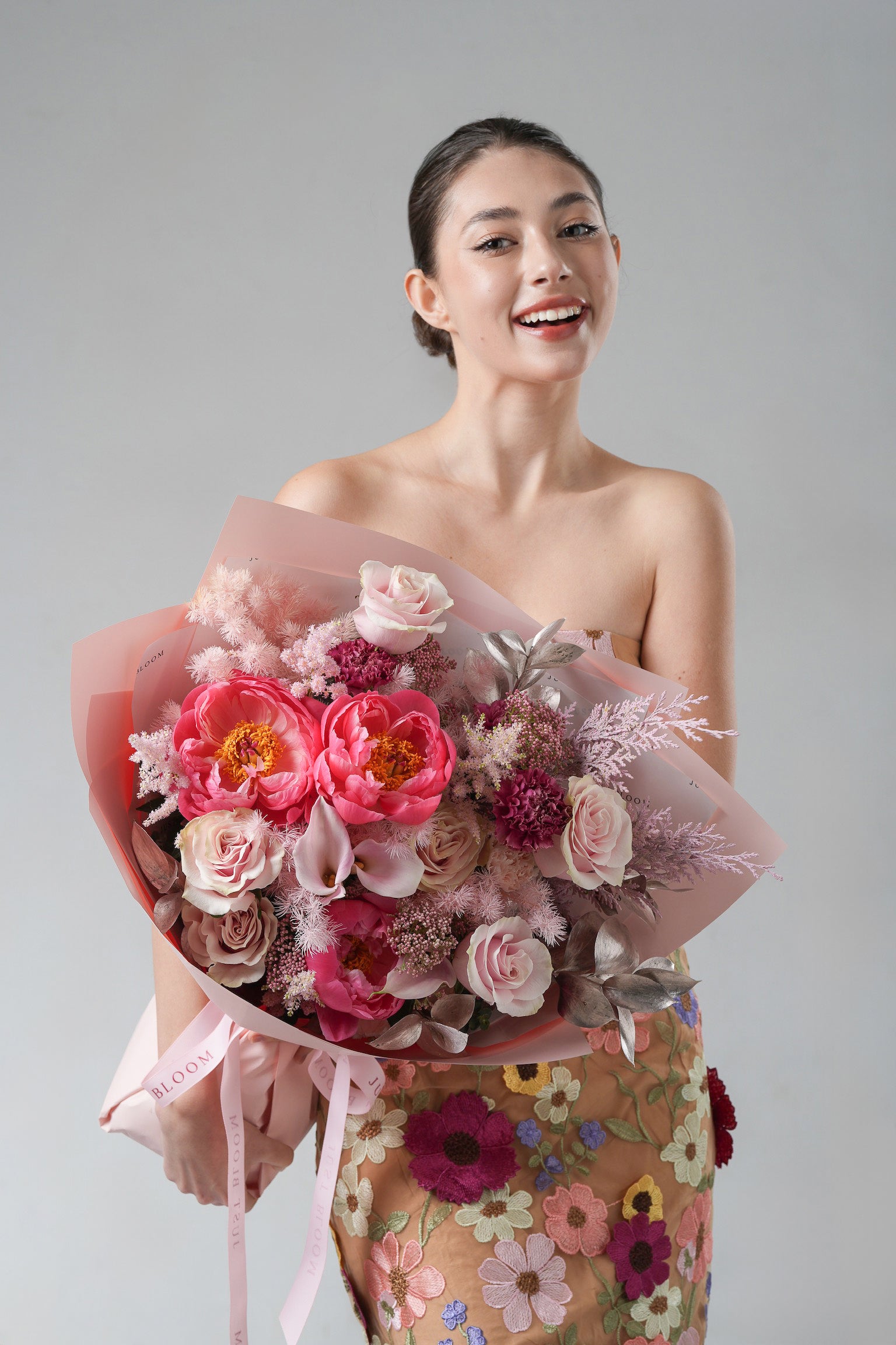 Her Moments - A Mother’s Day bouquet with blush roses, pink peonies, calla lilies, and delicate fillers. A soft and elegant floral tribute from Just Bloom HK.