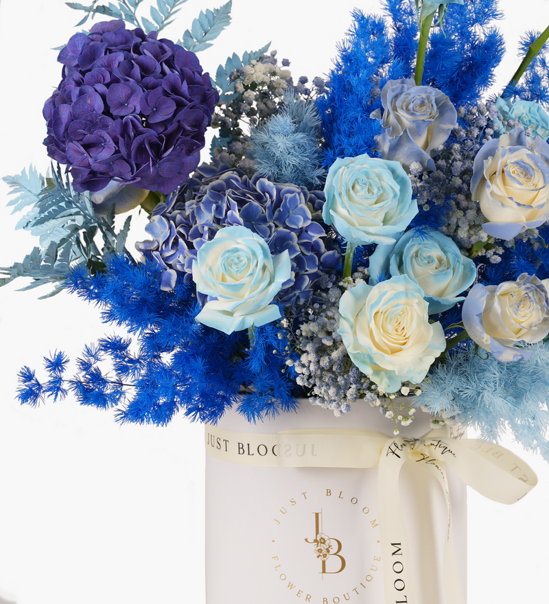 Ecuadorian roses and hydrangea in a chic and modern blue flower box by Just Bloom Hong Kong Florist