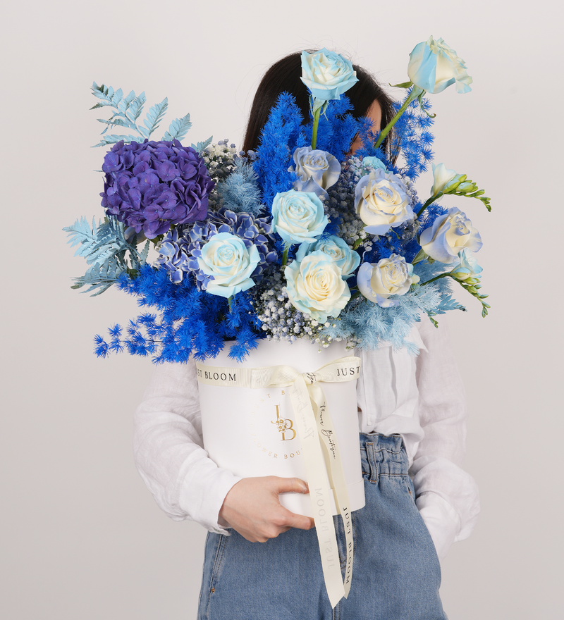 Ecuadorian roses and hydrangea in a chic and modern blue flower box by Just Bloom Hong Kong Florist