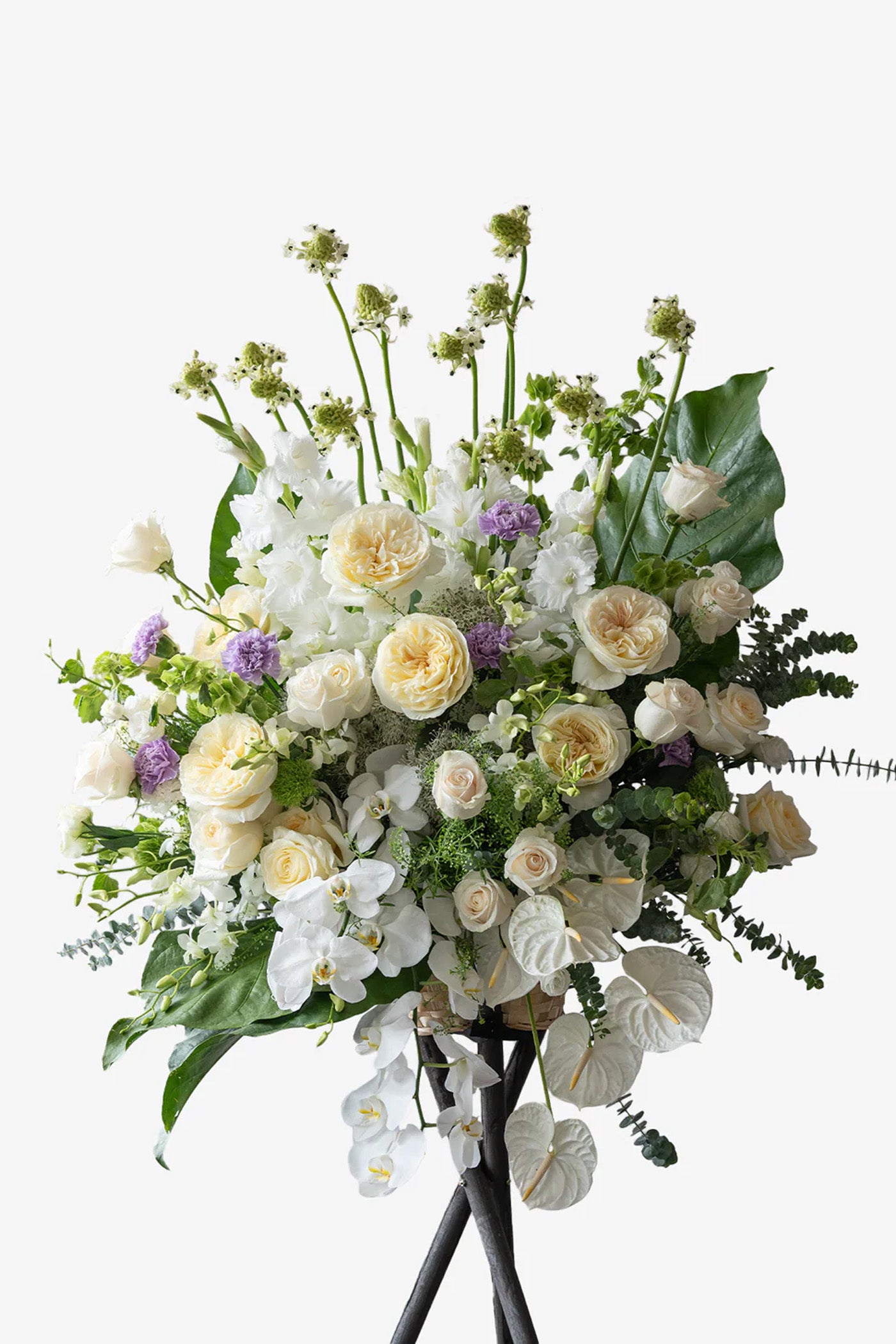 Kindness premium white funeral floral stand with roses, orchids, and Dutch greenery on tripod stand