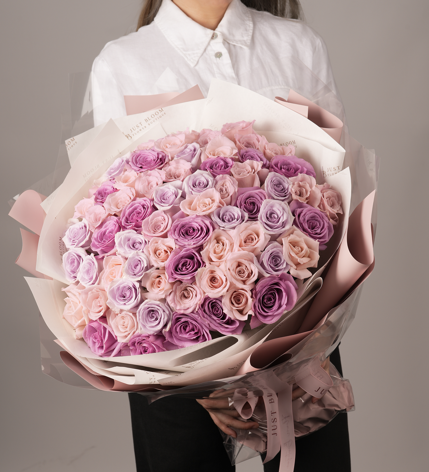 Close-up view of Kora purple pink rose bouquet showing gradient colour arrangement and premium wrapping