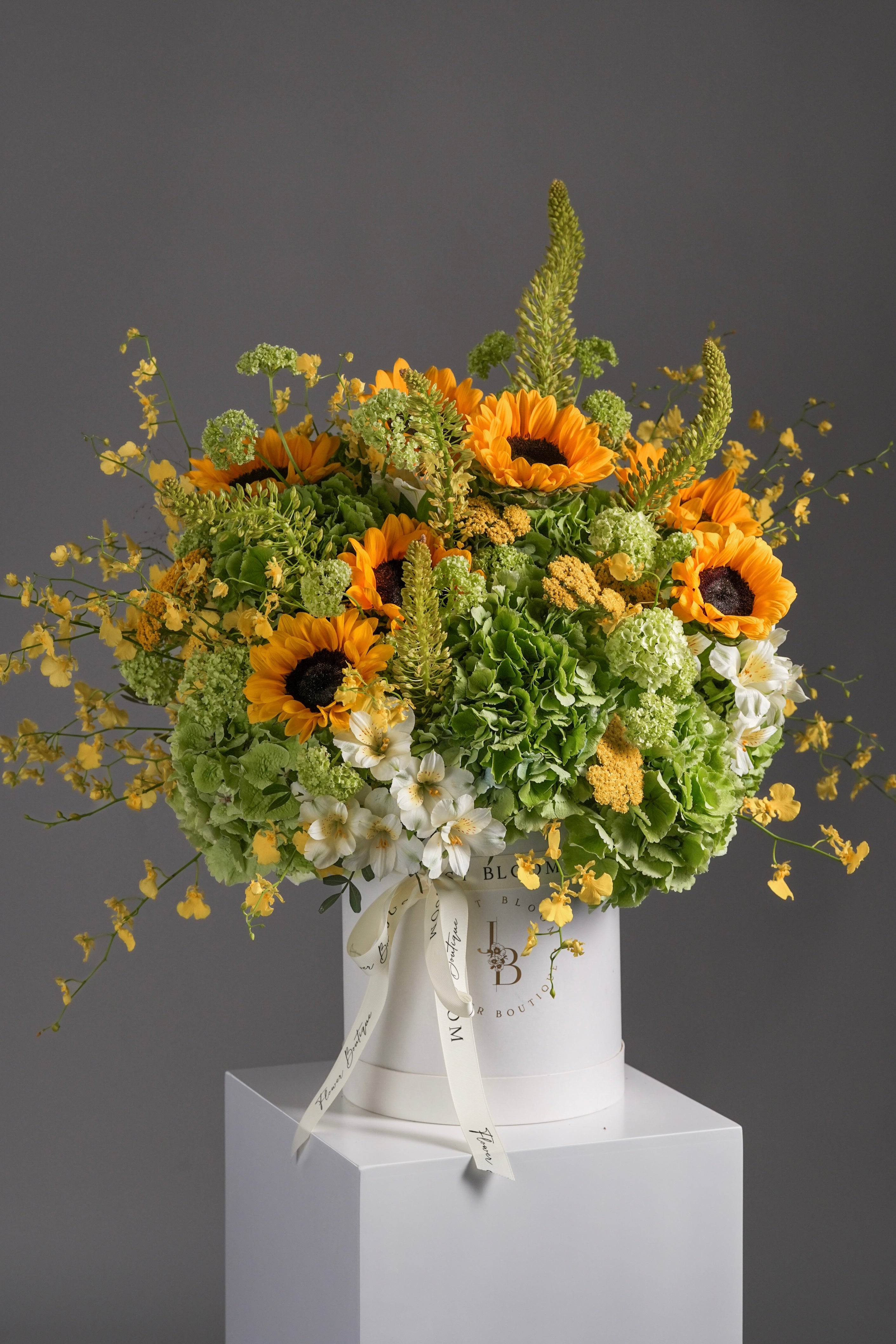 Leo flower box with sunflowers and green hydrangeas – studio product shot | Just Bloom HK