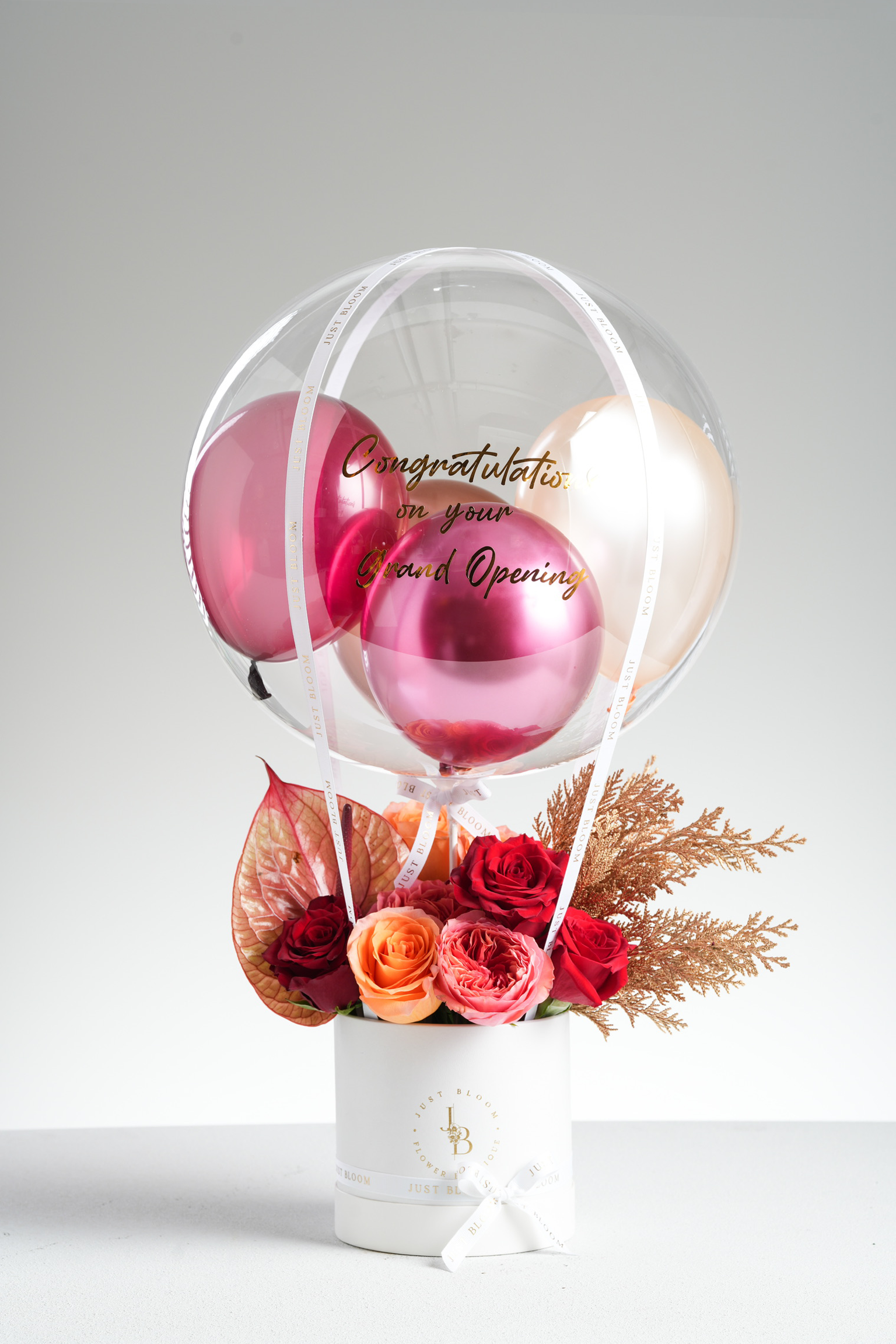 Liberty luxury rose flower box with balloon decoration featuring red and orange roses in white hatbox