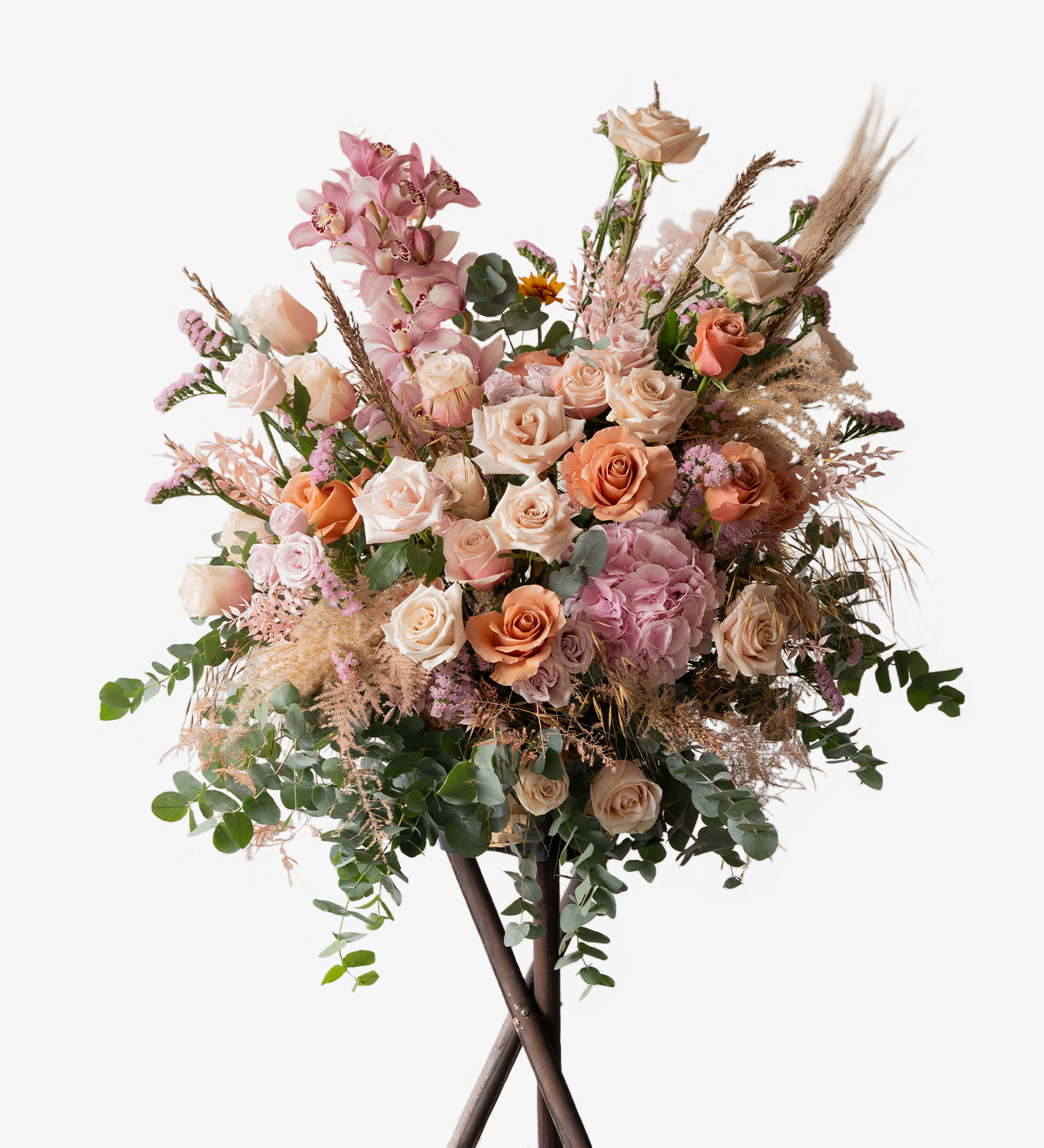 Maci elegant opening flower stand with peach and pink roses, hydrangeas, cymbidiums, and dried foliage