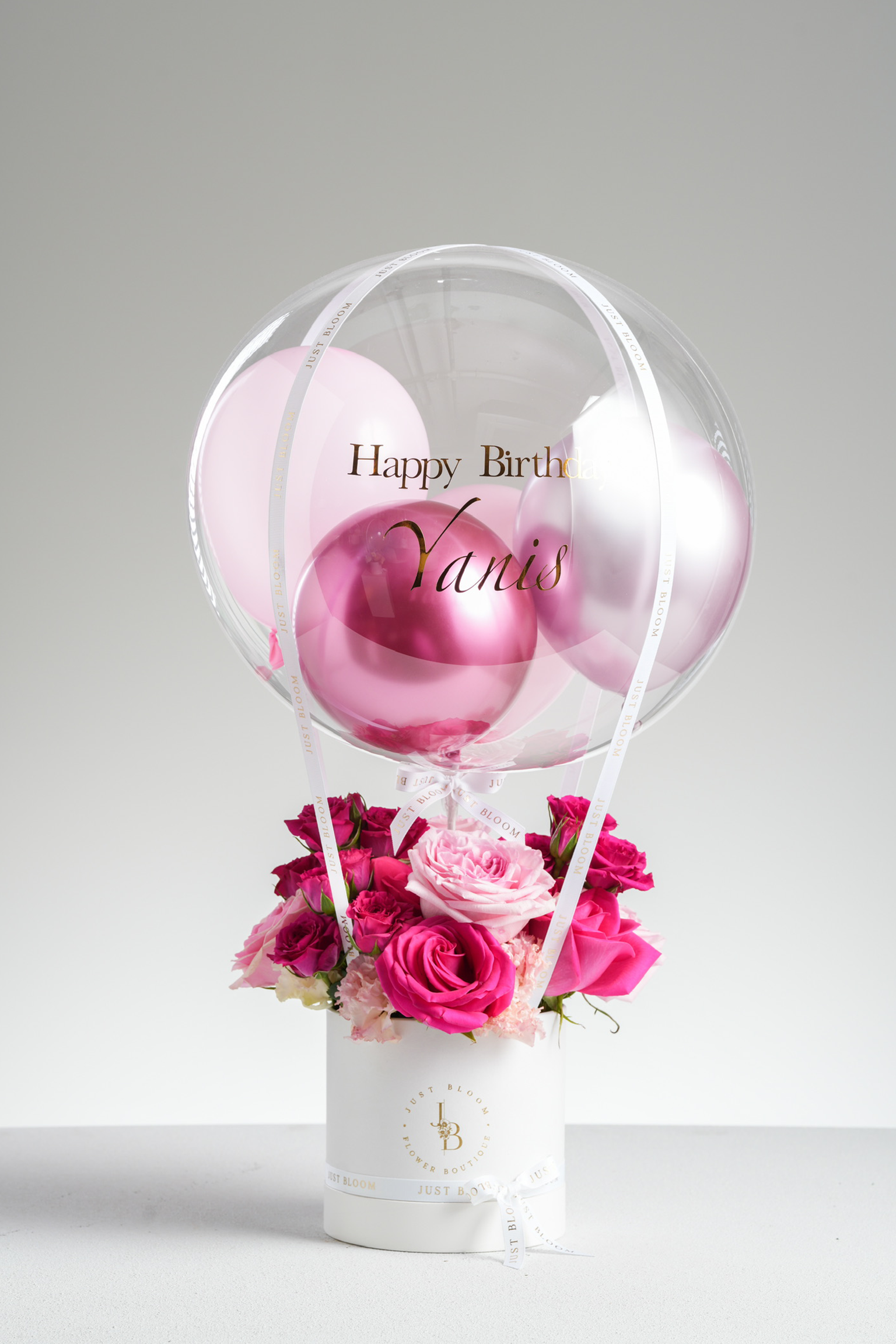 Melany elegant pink and blush rose hatbox arrangement with carnations and spray roses