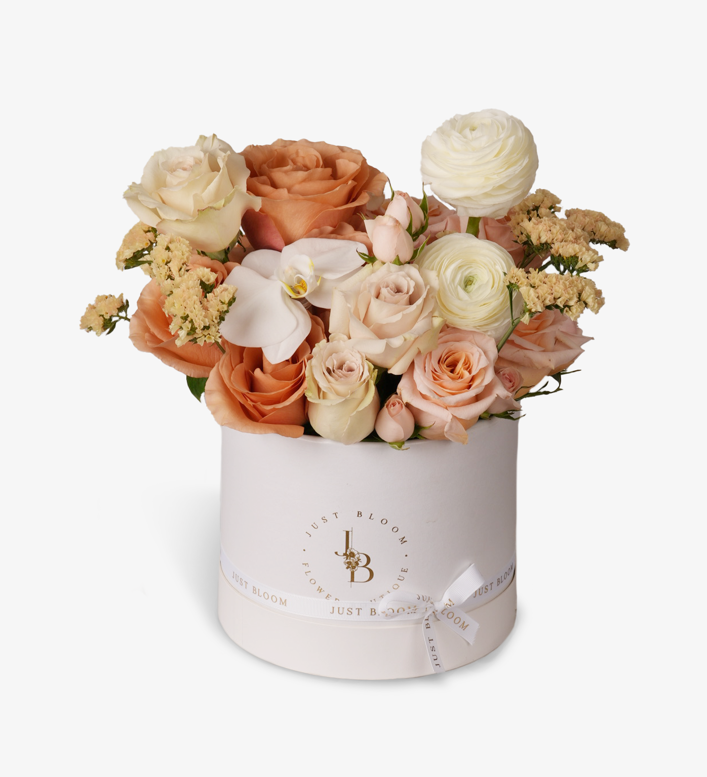 Miracle warm apricot and blush rose floral box with orchids and ranunculus