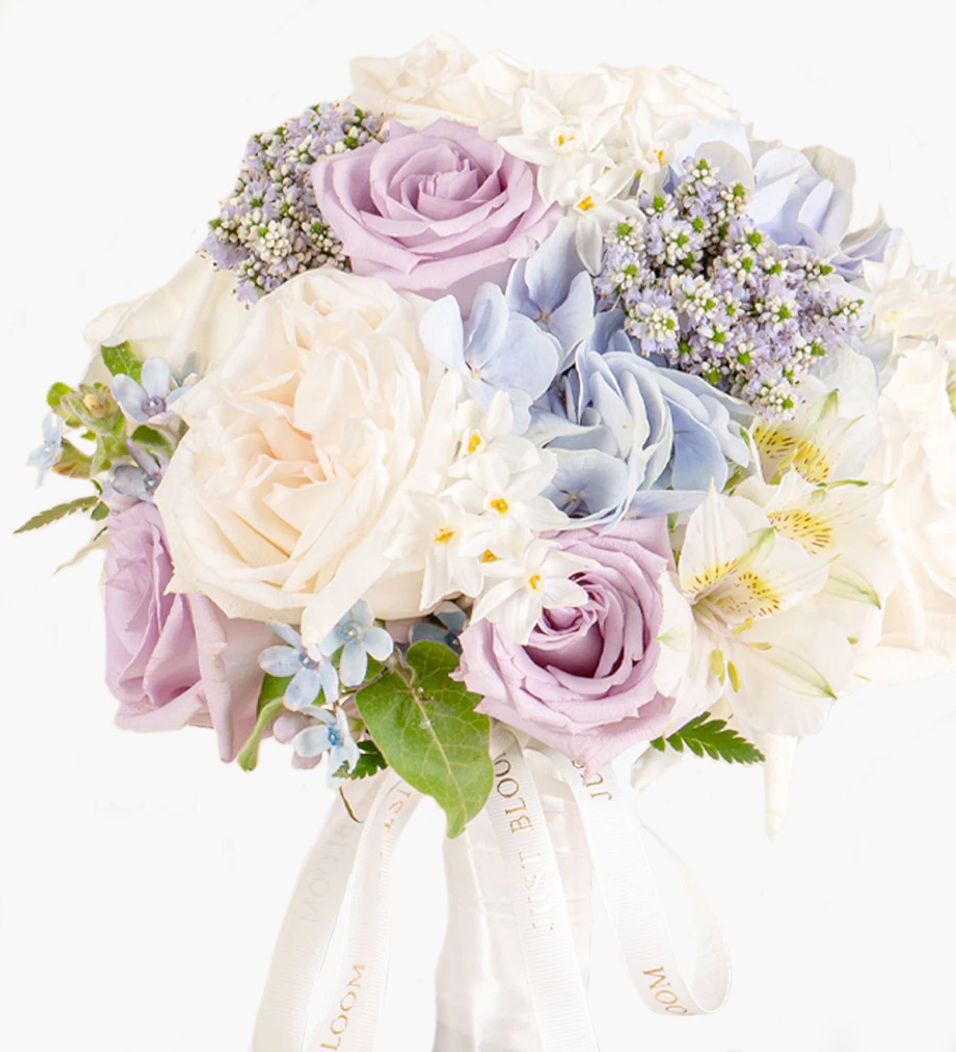  Morgan closeup showing soft garden roses, hydrangeas, and delicate filler flowers in bridal tones