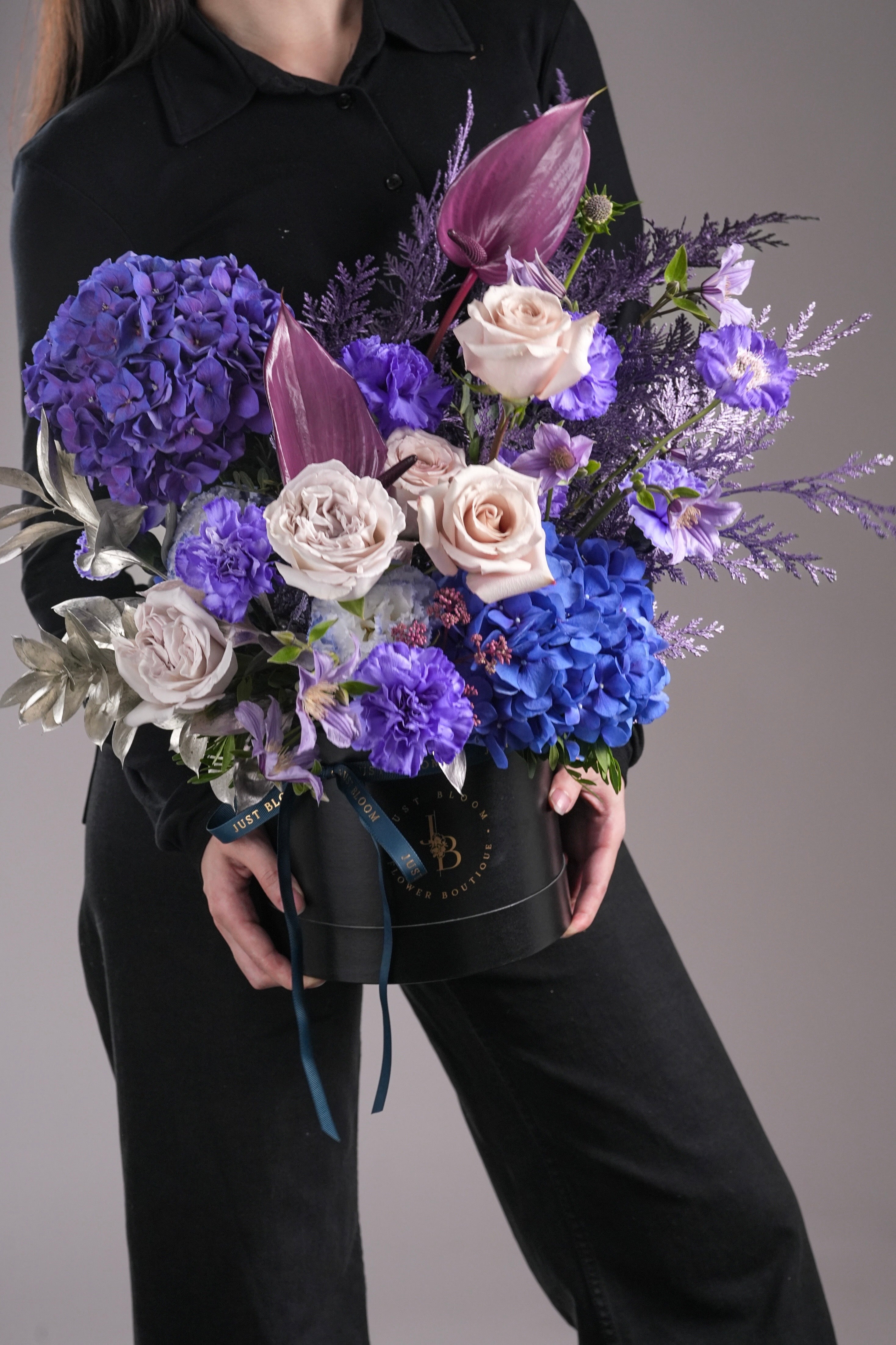 Noel flower box with blue and purple flowers in elegant modern style