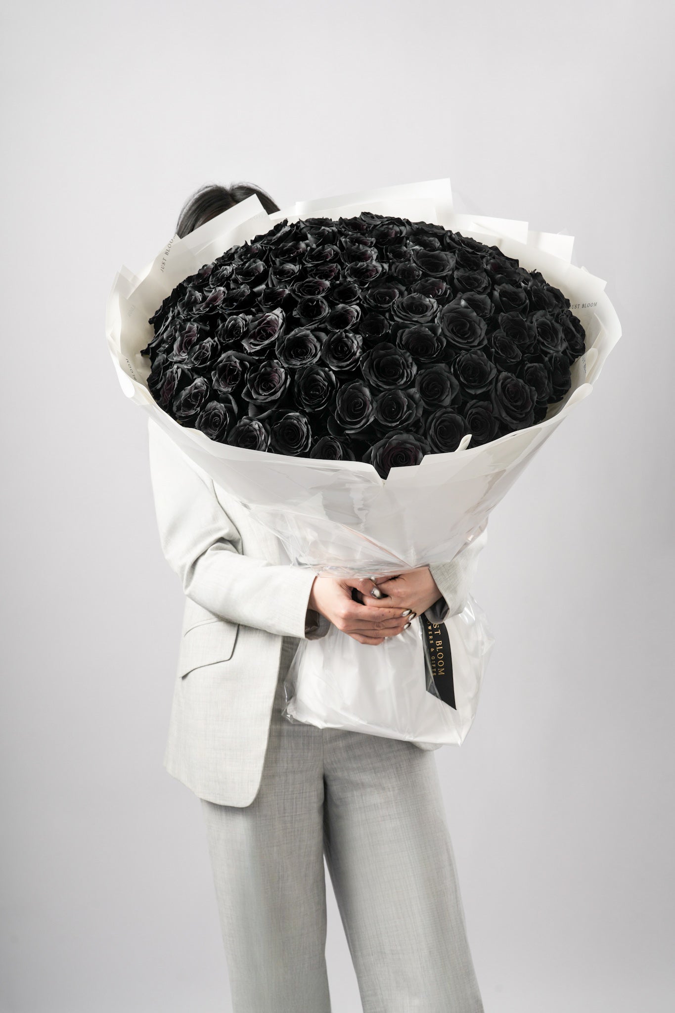 Noir bouquet with 99 black Ecuadorian roses in grand size